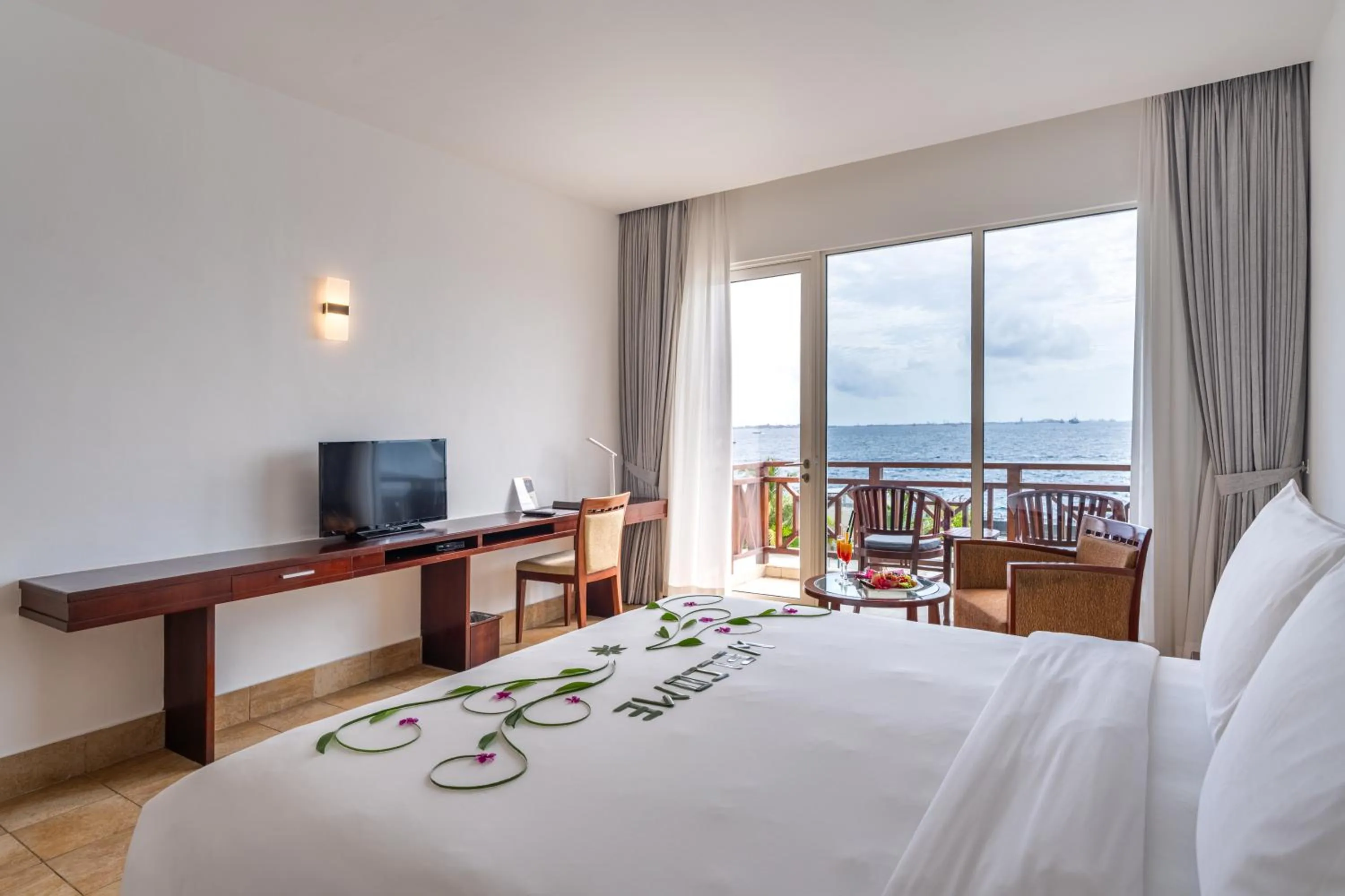 TV and multimedia, Bed in Hulhule Island Hotel- Private Beach Access & Airport Pick-up and Drop