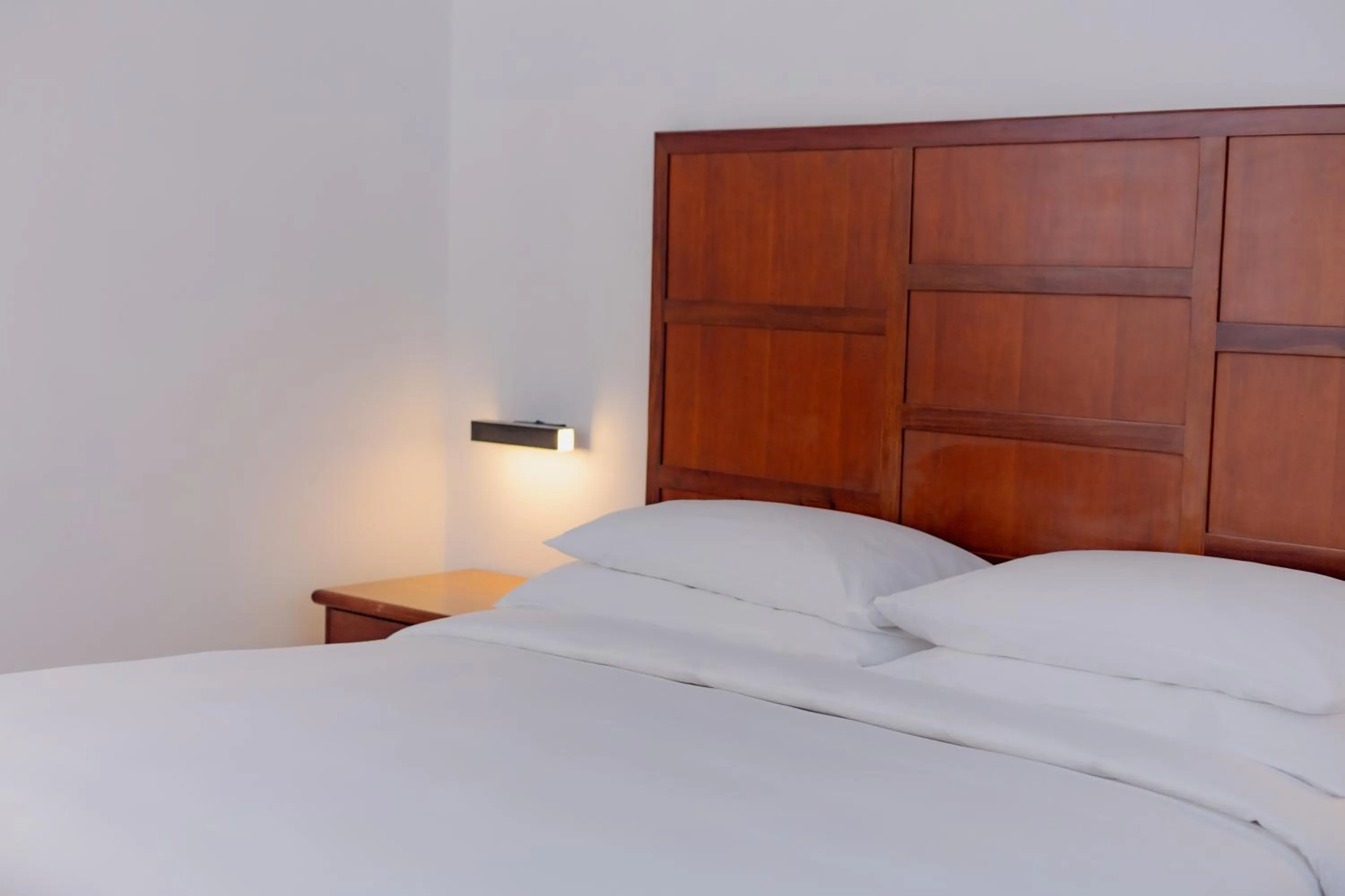 Bed in Hulhule Island Hotel- Private Beach Access & Airport Pick-up and Drop