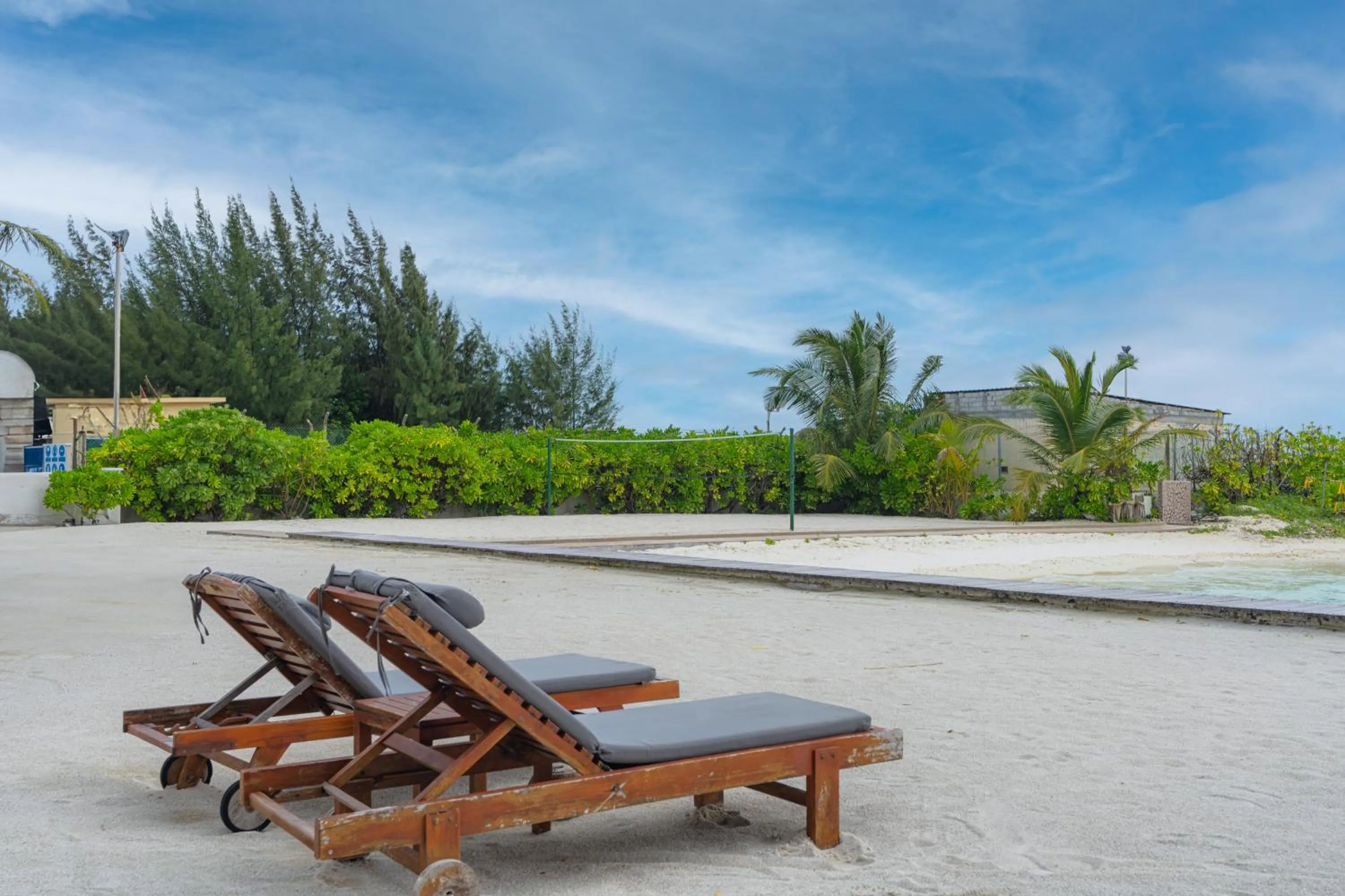 Property building in Hulhule Island Hotel- Private Beach Access & Airport Pick-up and Drop