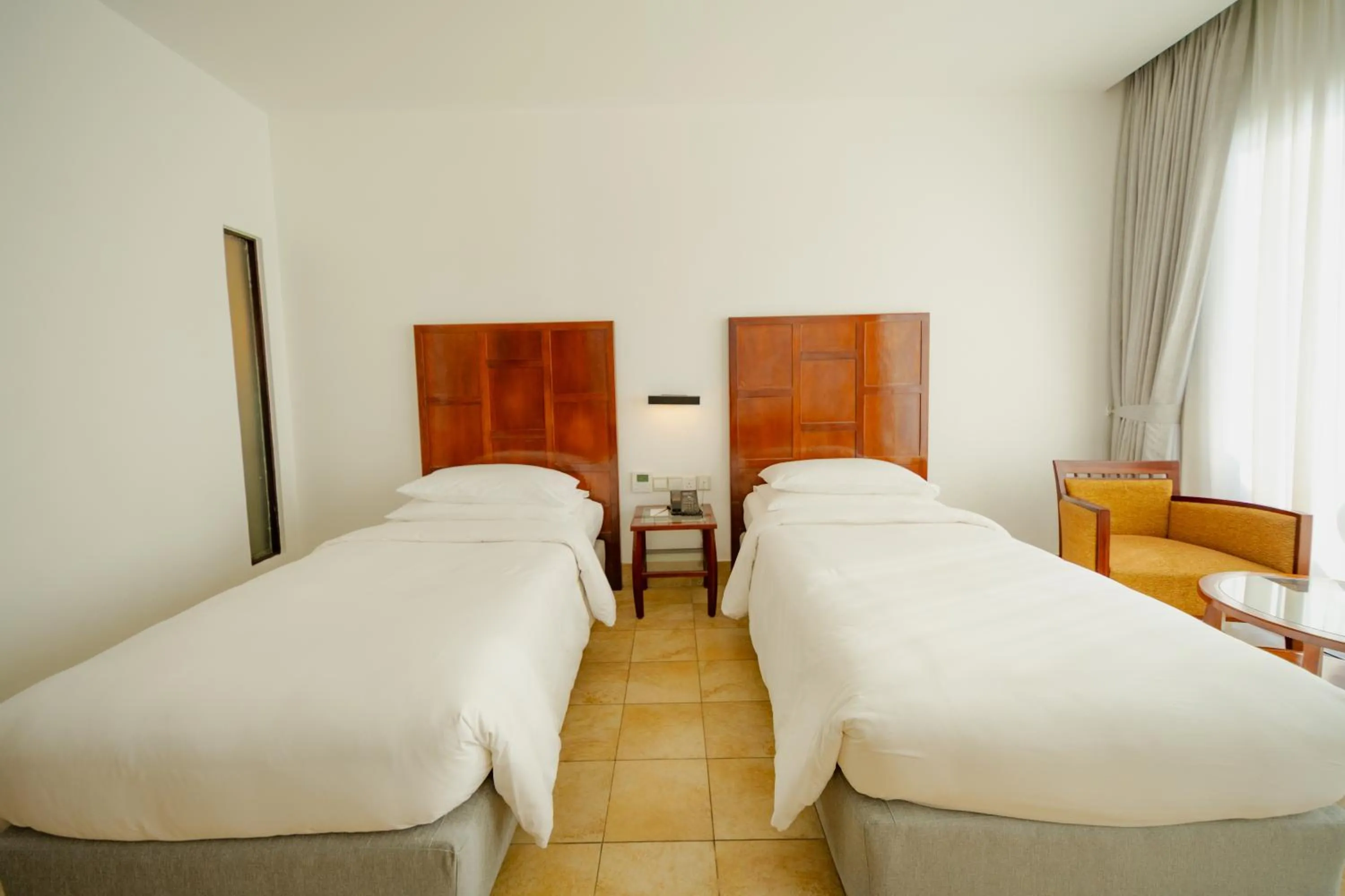 Bed in Hulhule Island Hotel- Private Beach Access & Airport Pick-up and Drop