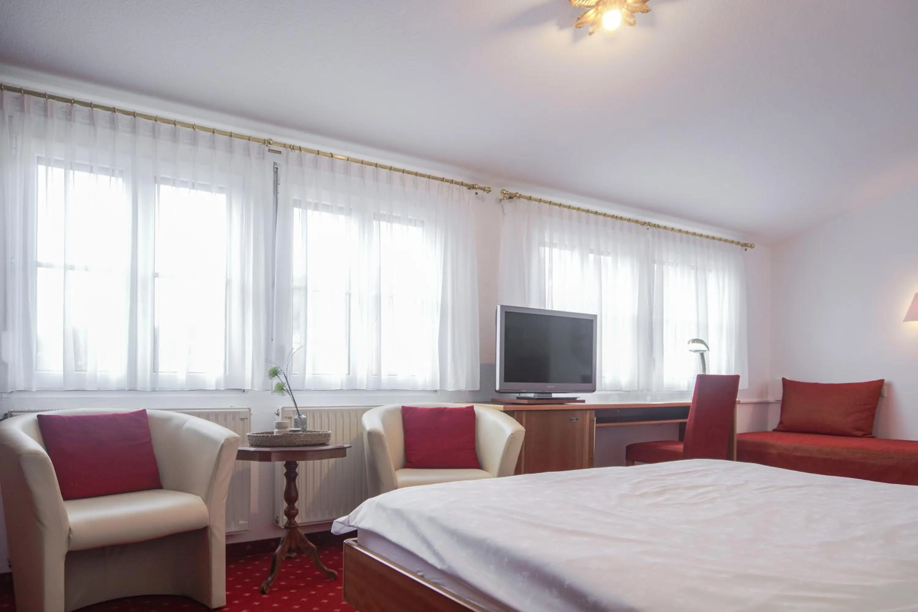 Bed in Hotel Garni in der Breite