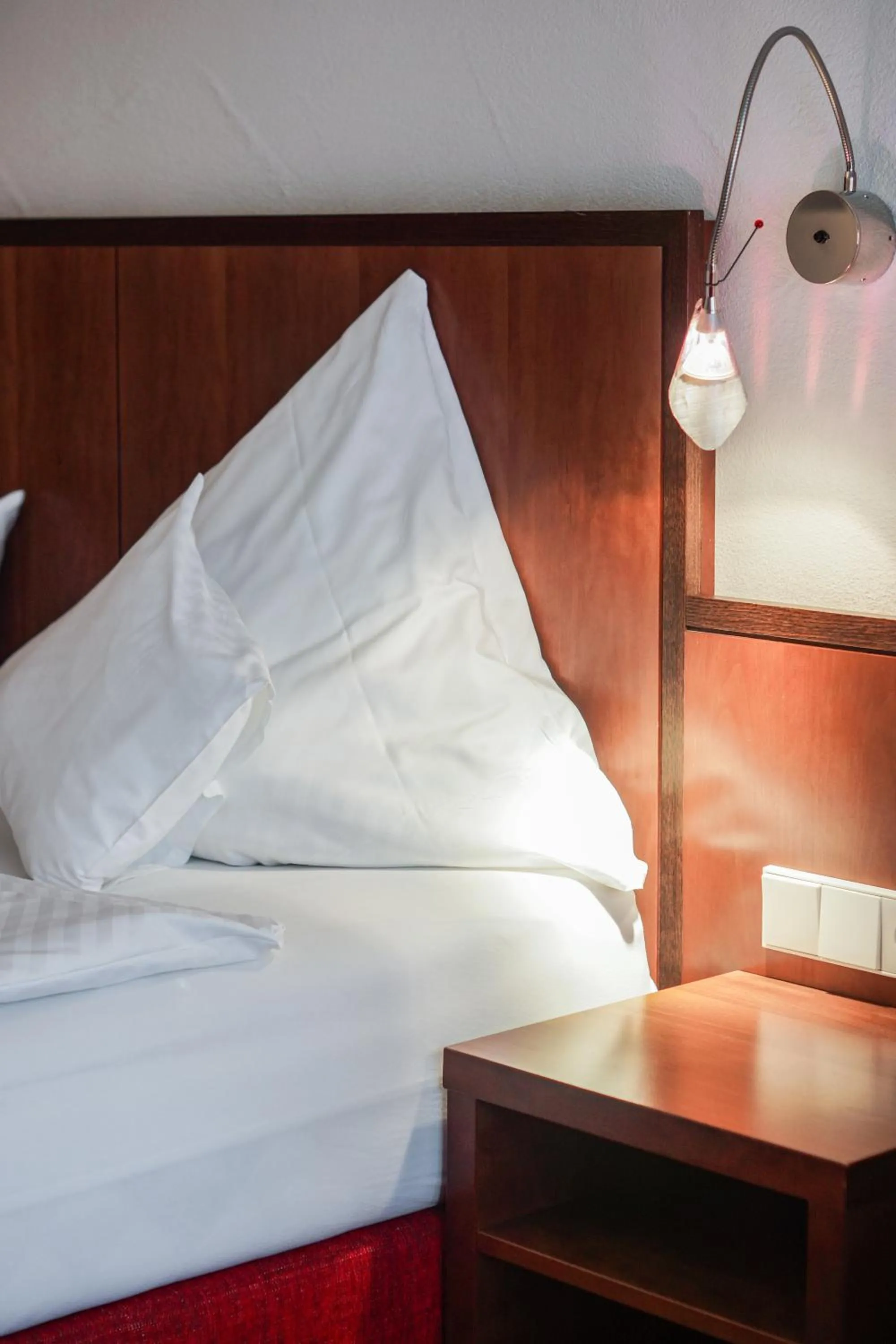 Bed in Hotel Garni in der Breite