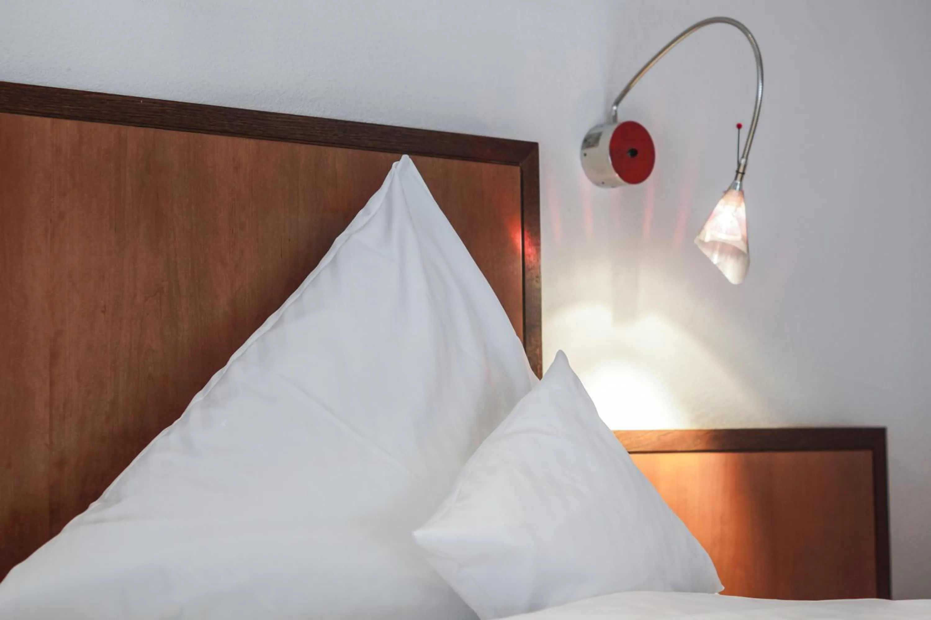 Bed in Hotel Garni in der Breite