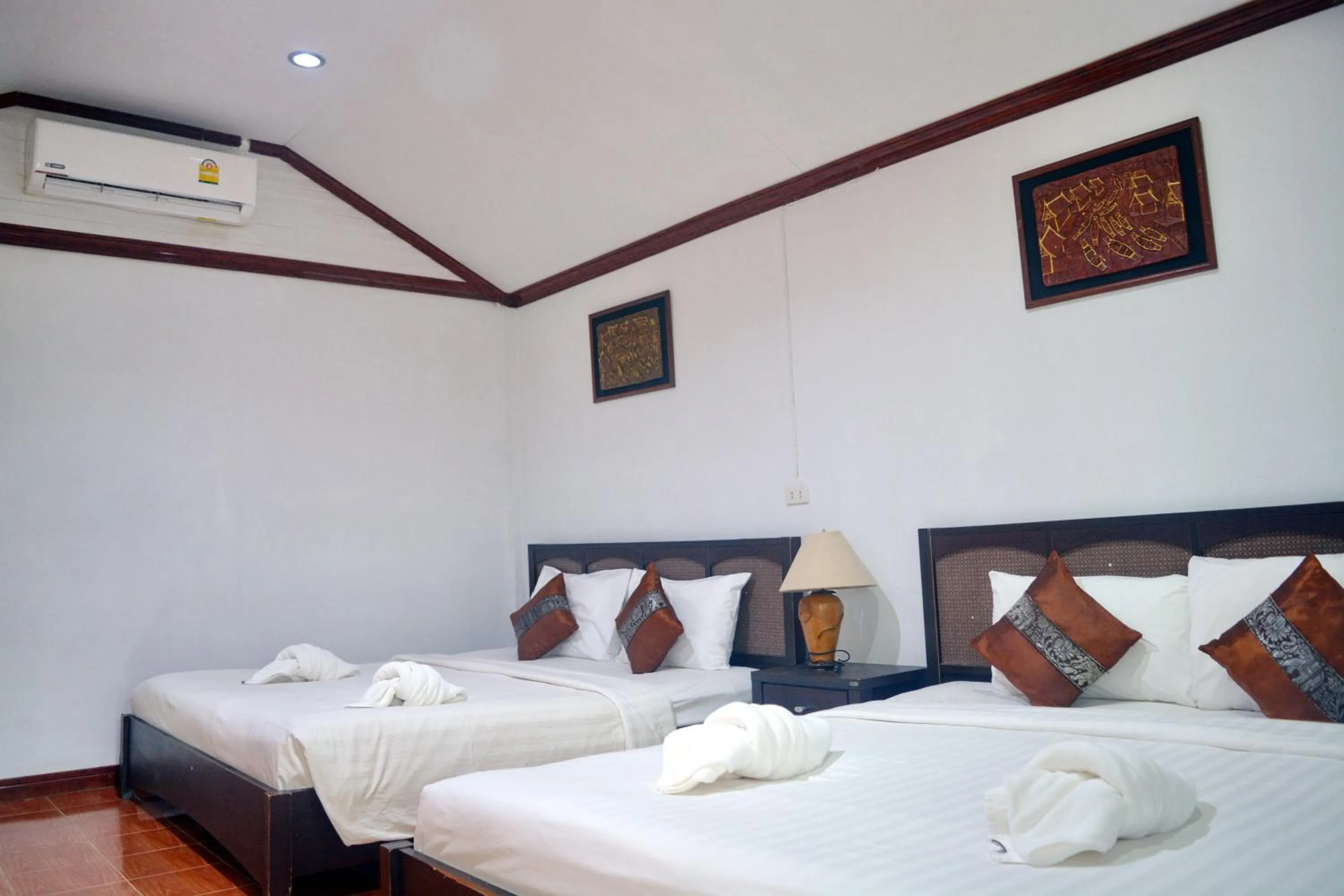 Bed in Lanta IL Mare Beach Resort