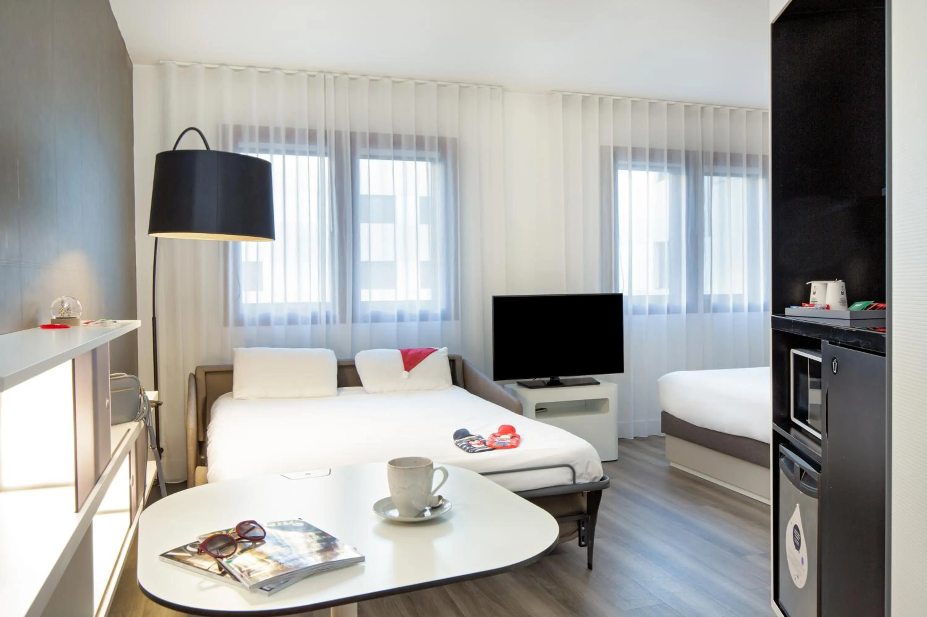 Photo of the whole room, Bed in Novotel Suites Perpignan Centre - Grandes Suites & Confort Centre-Ville