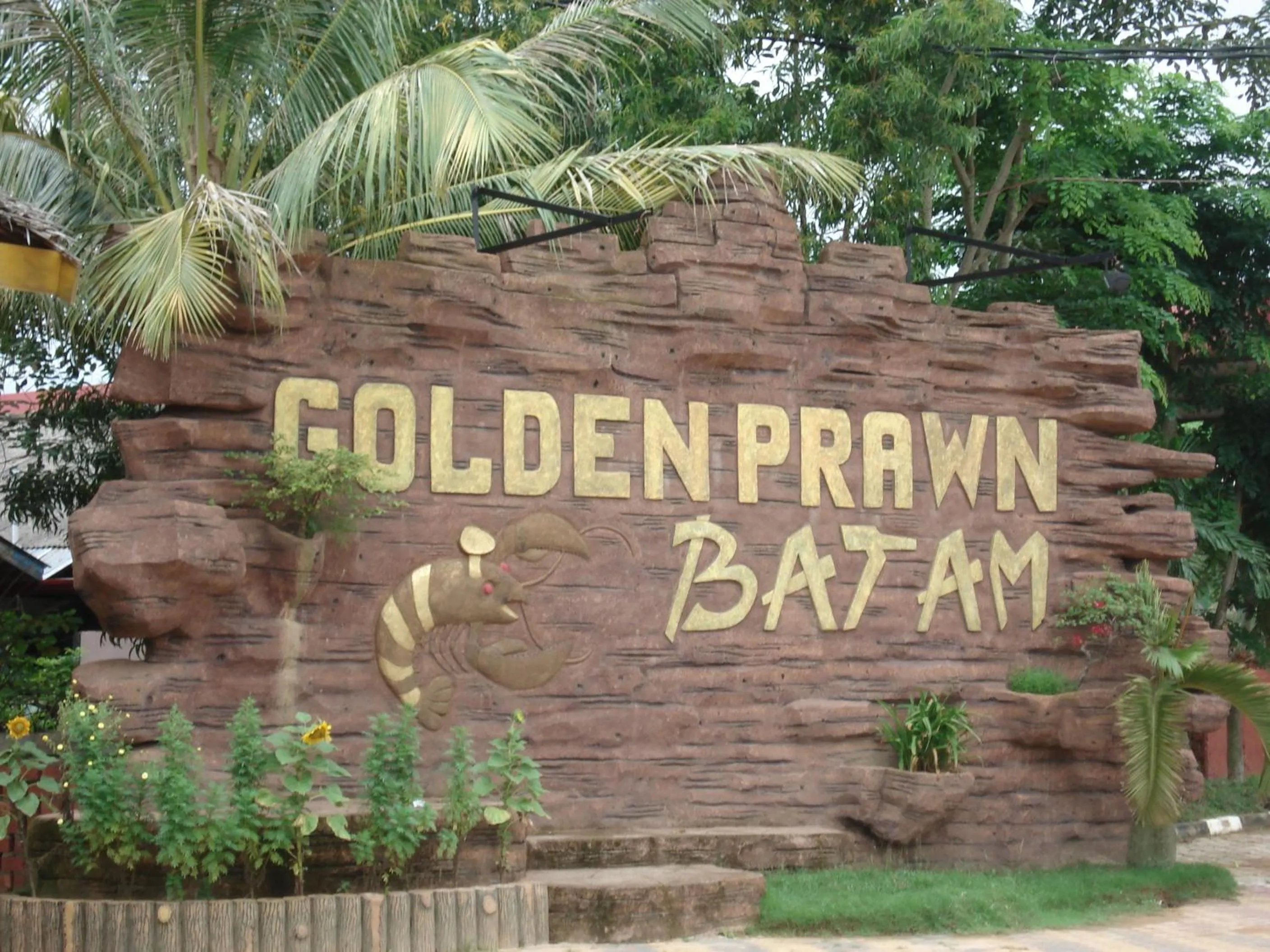 Property logo or sign in Golden View Hotel
