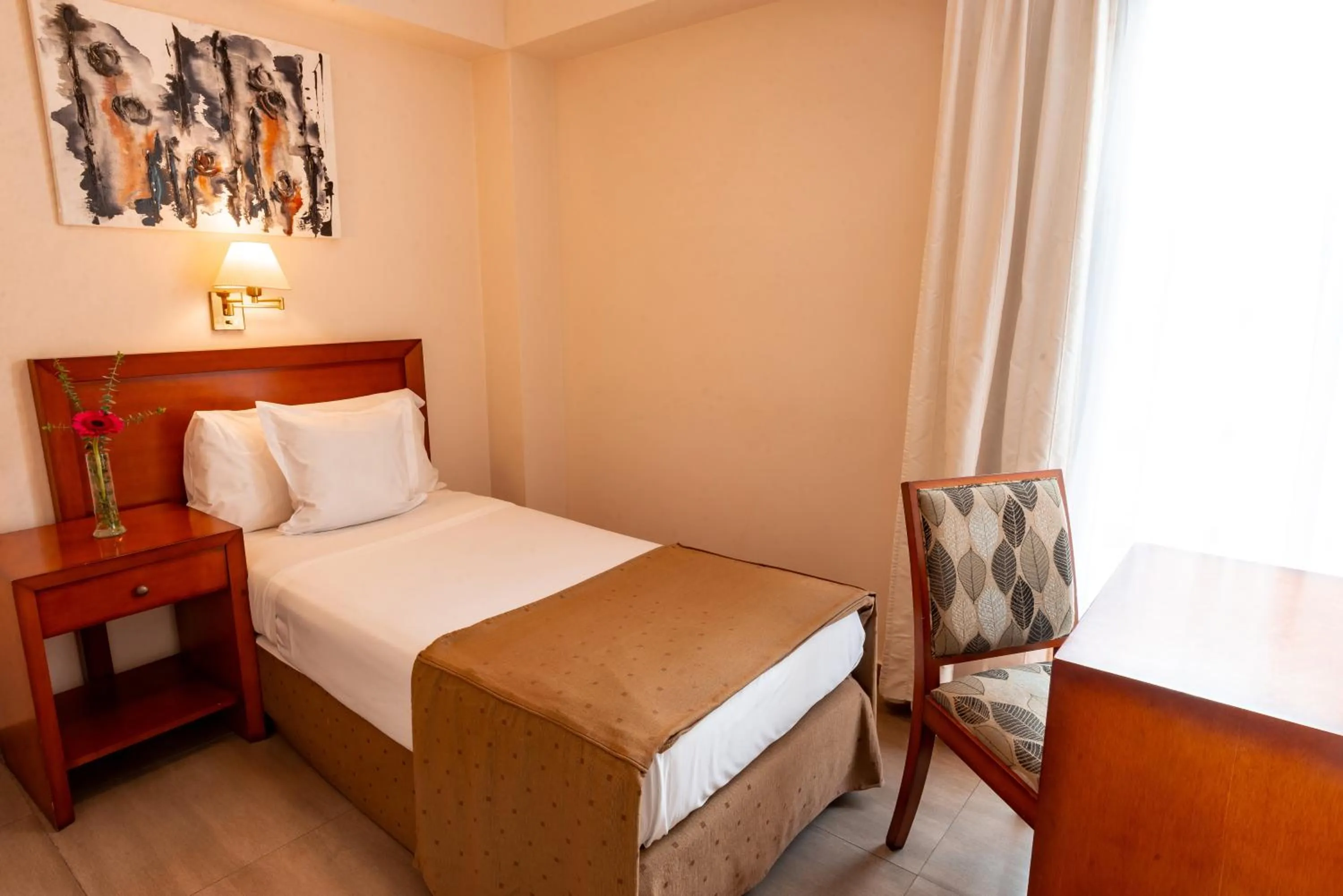 Bed in Hotel Riviera