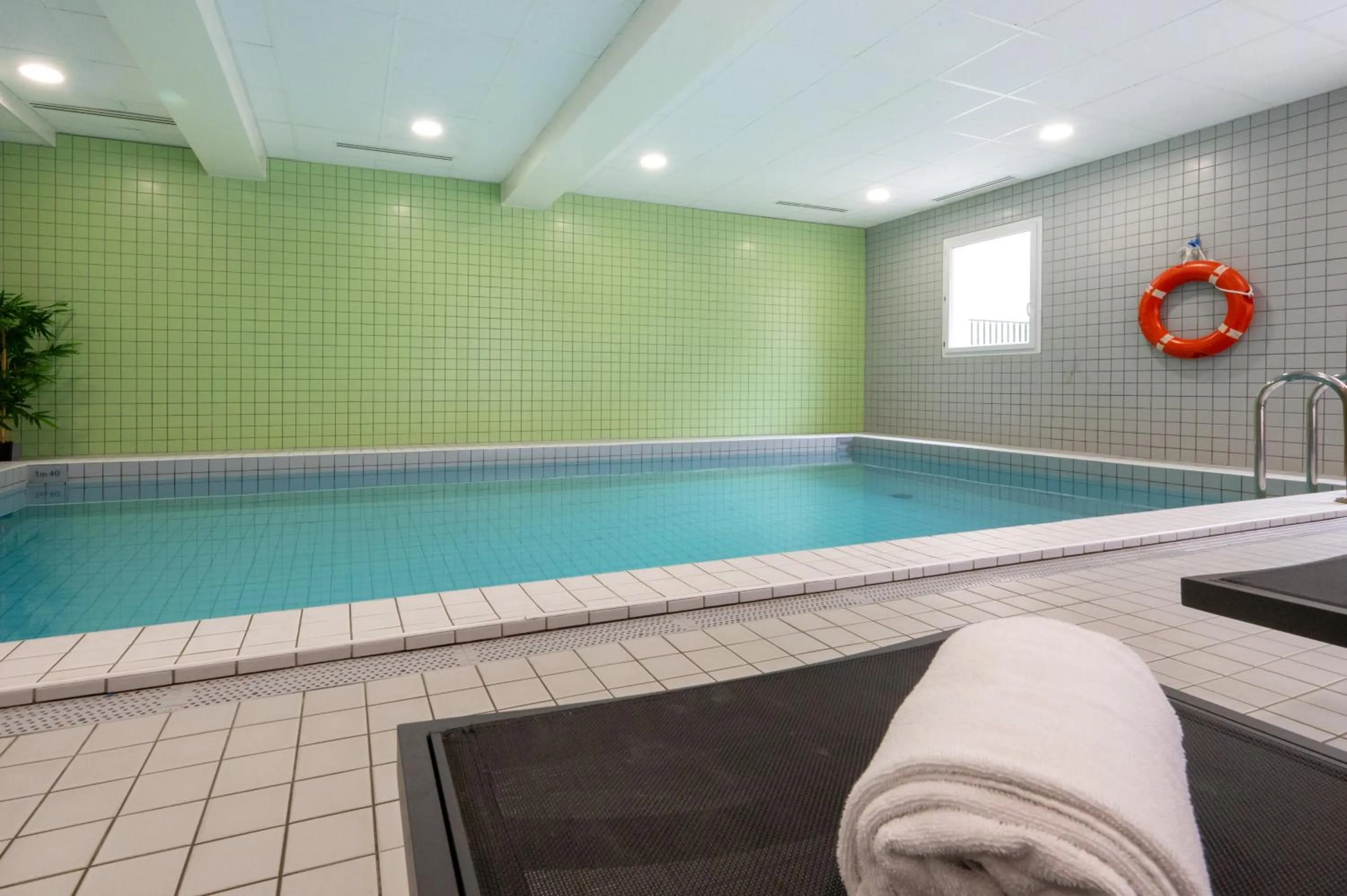 Swimming pool in Nemea Appart Hotel Home Suite Nancy Centre