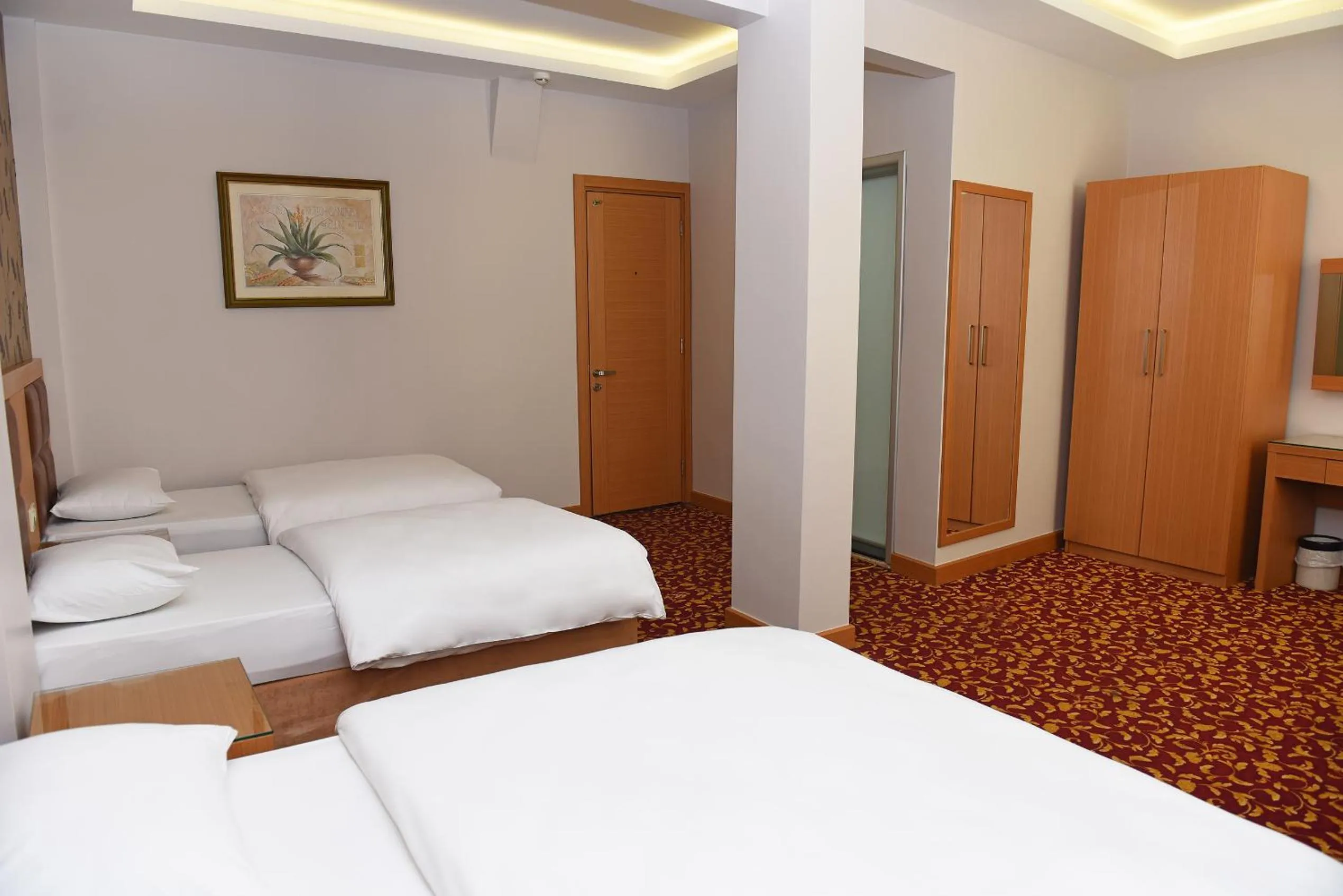 Bed in Hotel Grand Umit