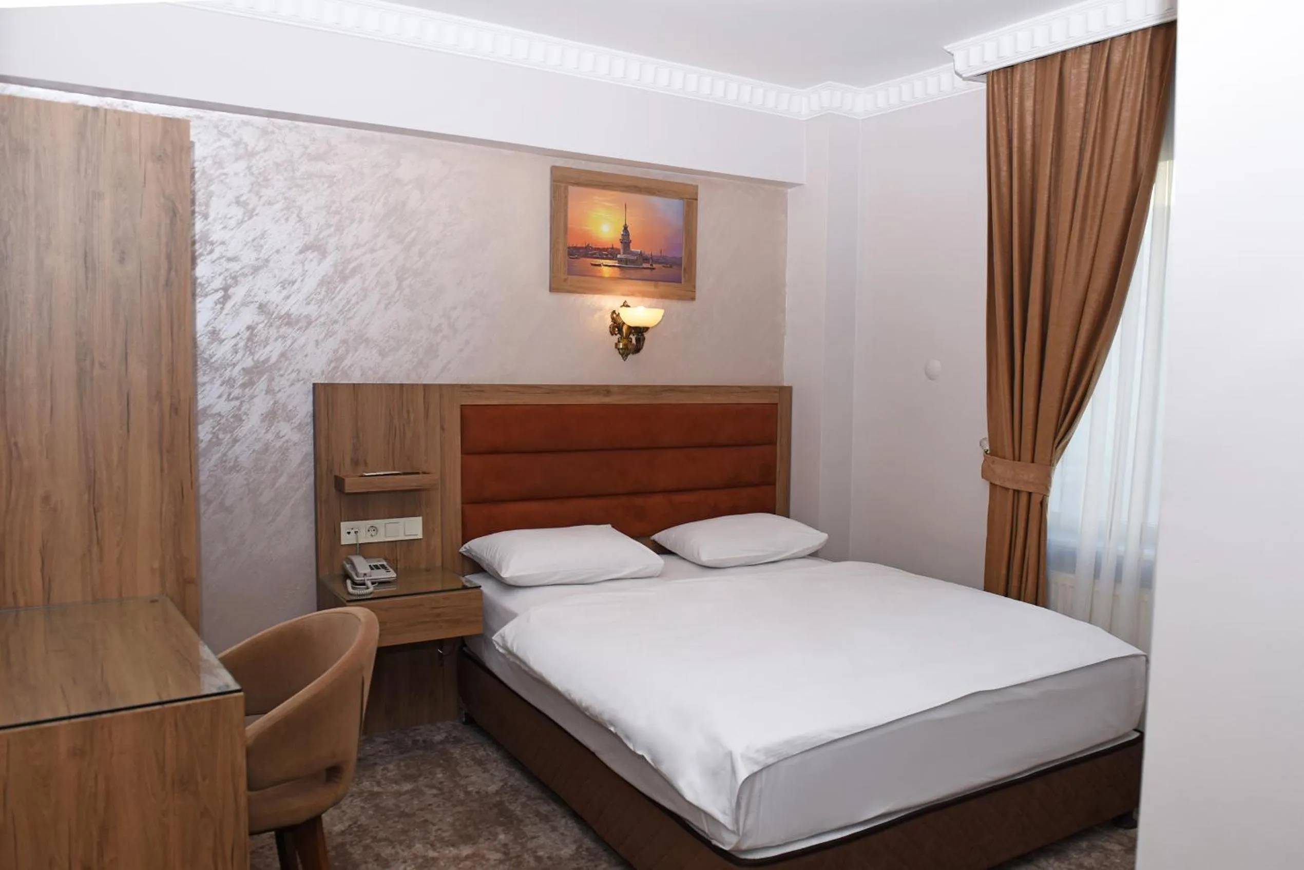 Bed in Hotel Grand Umit