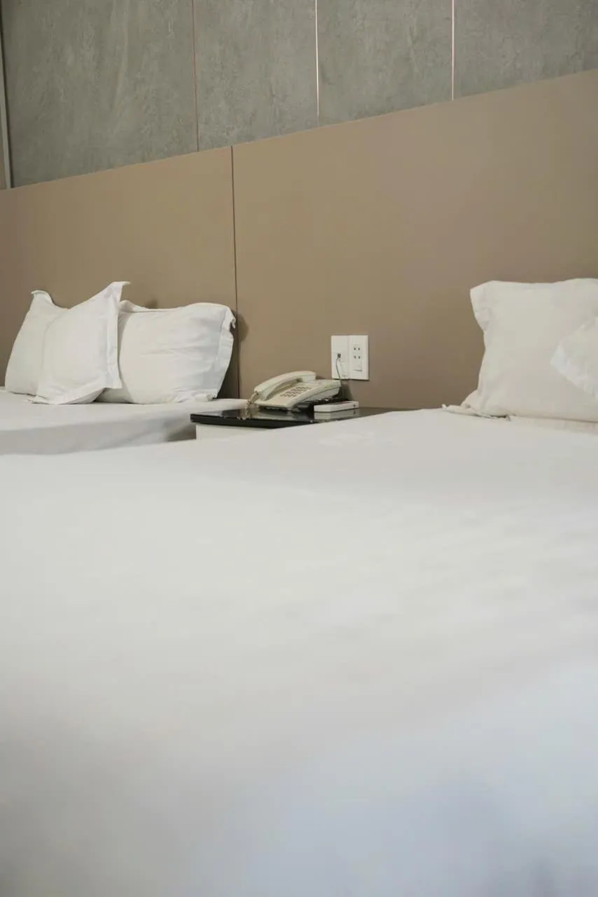 Bed in Ngoc Se Hotel