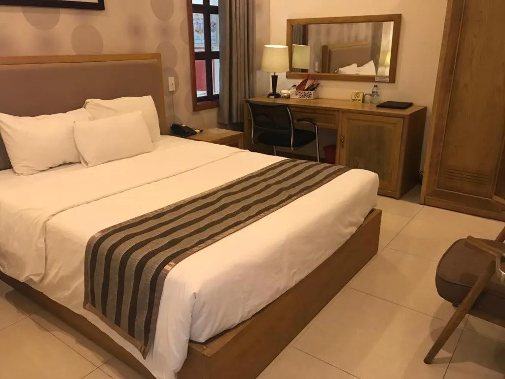 Bed in Elegant Hotel