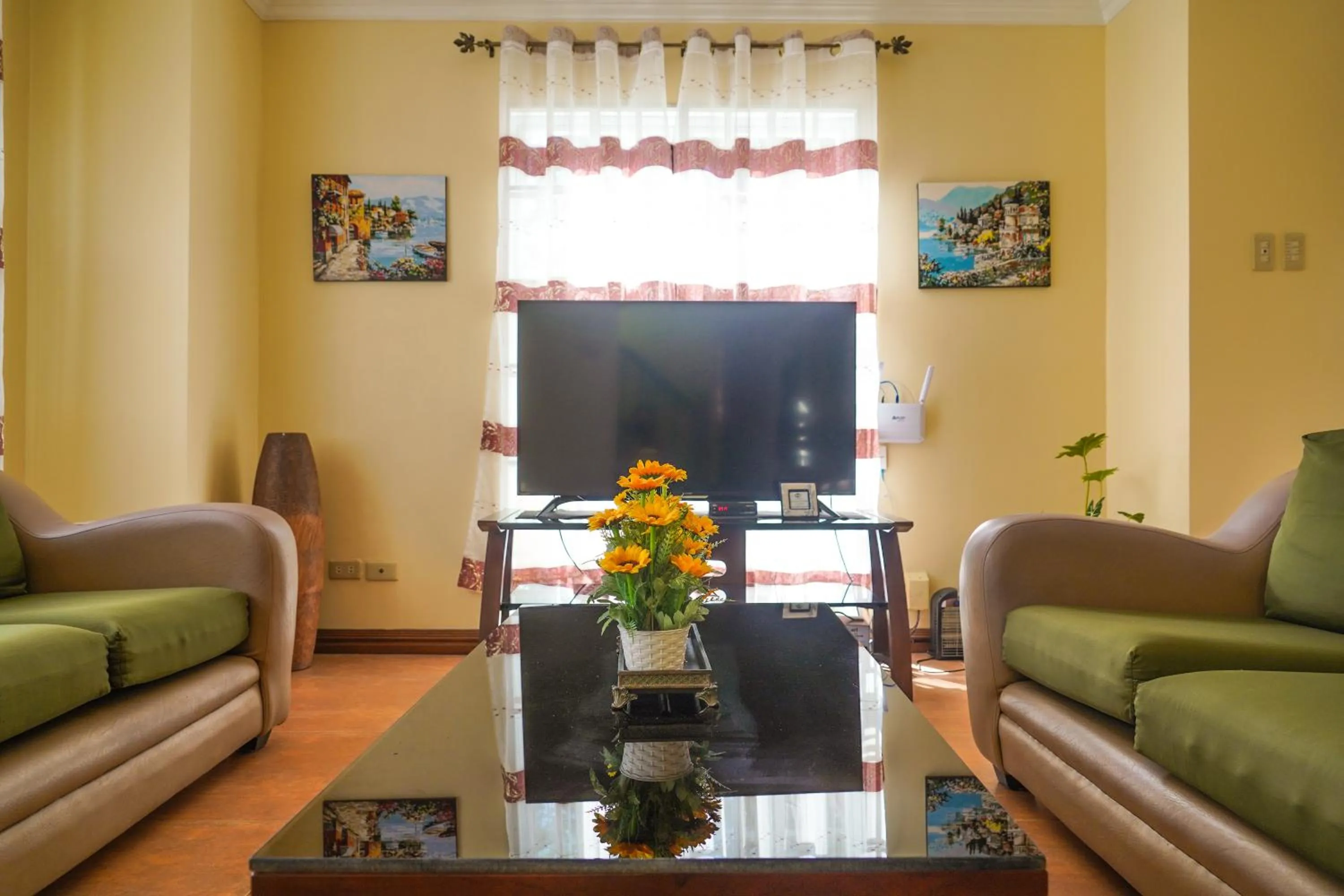 Communal lounge/ TV room in Charming Tagaytay Vacation Home