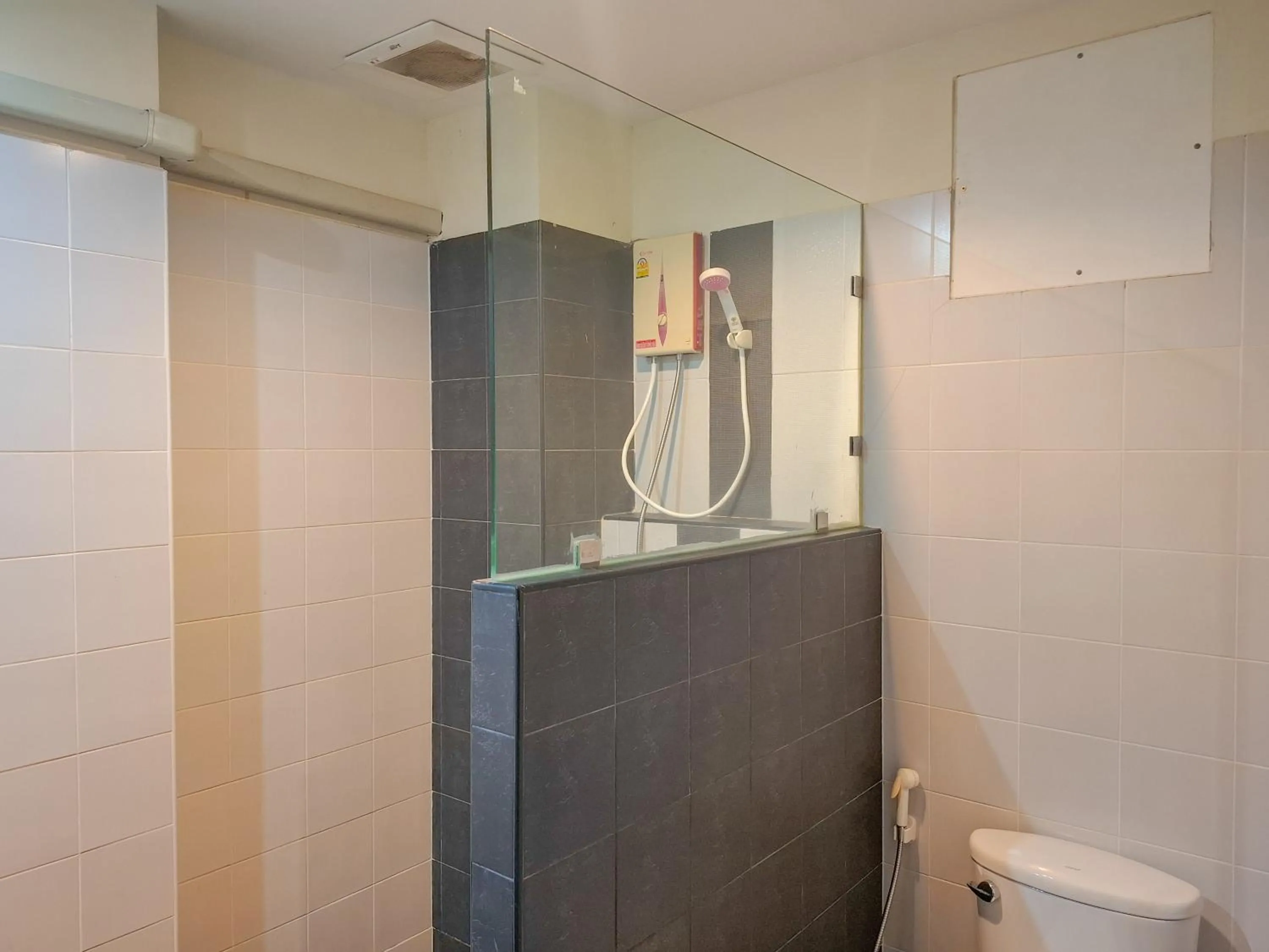 Shower in The Hideaway Resort Pattaya