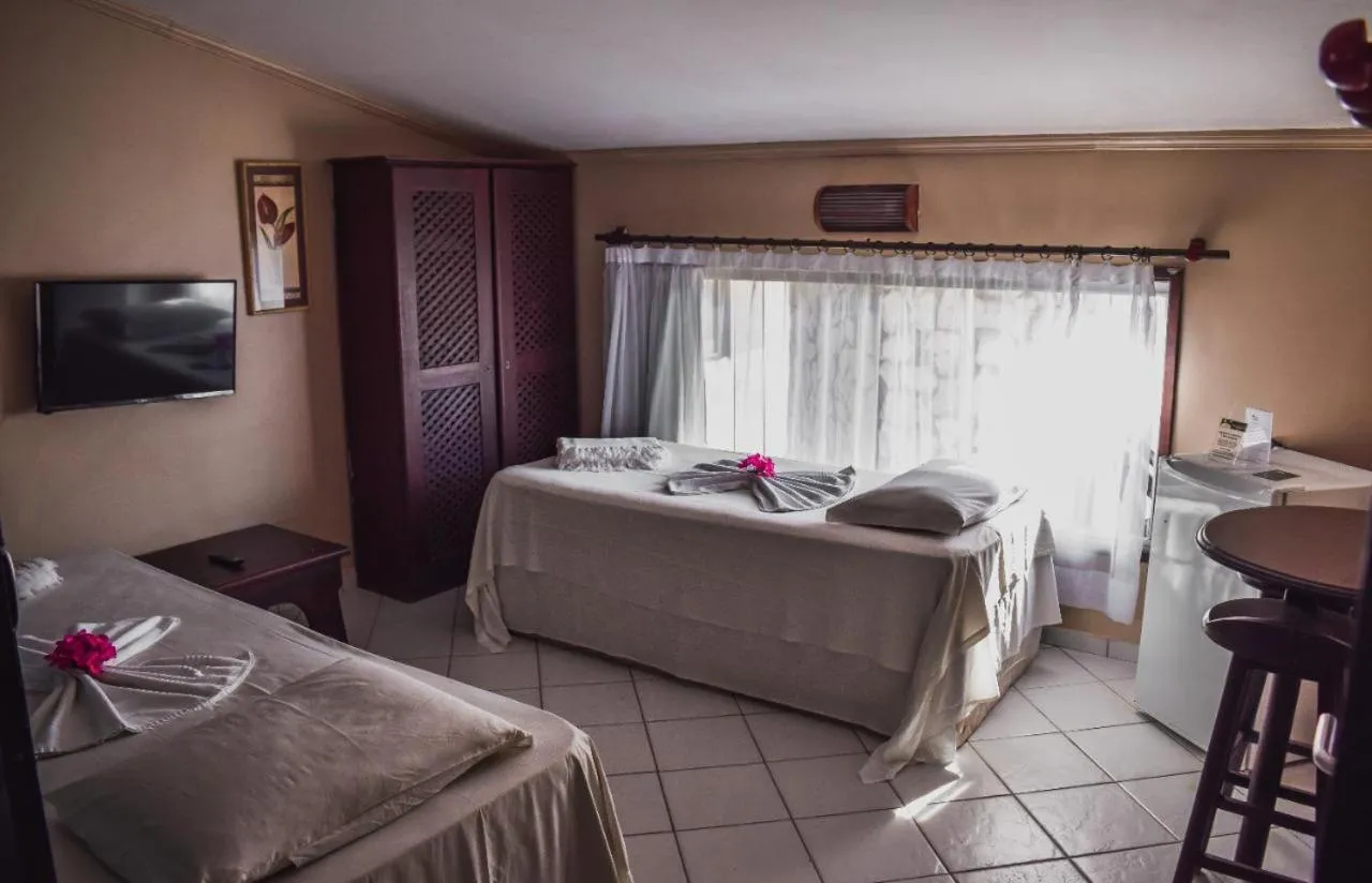 Bed in Pousada Recanto da Coruja