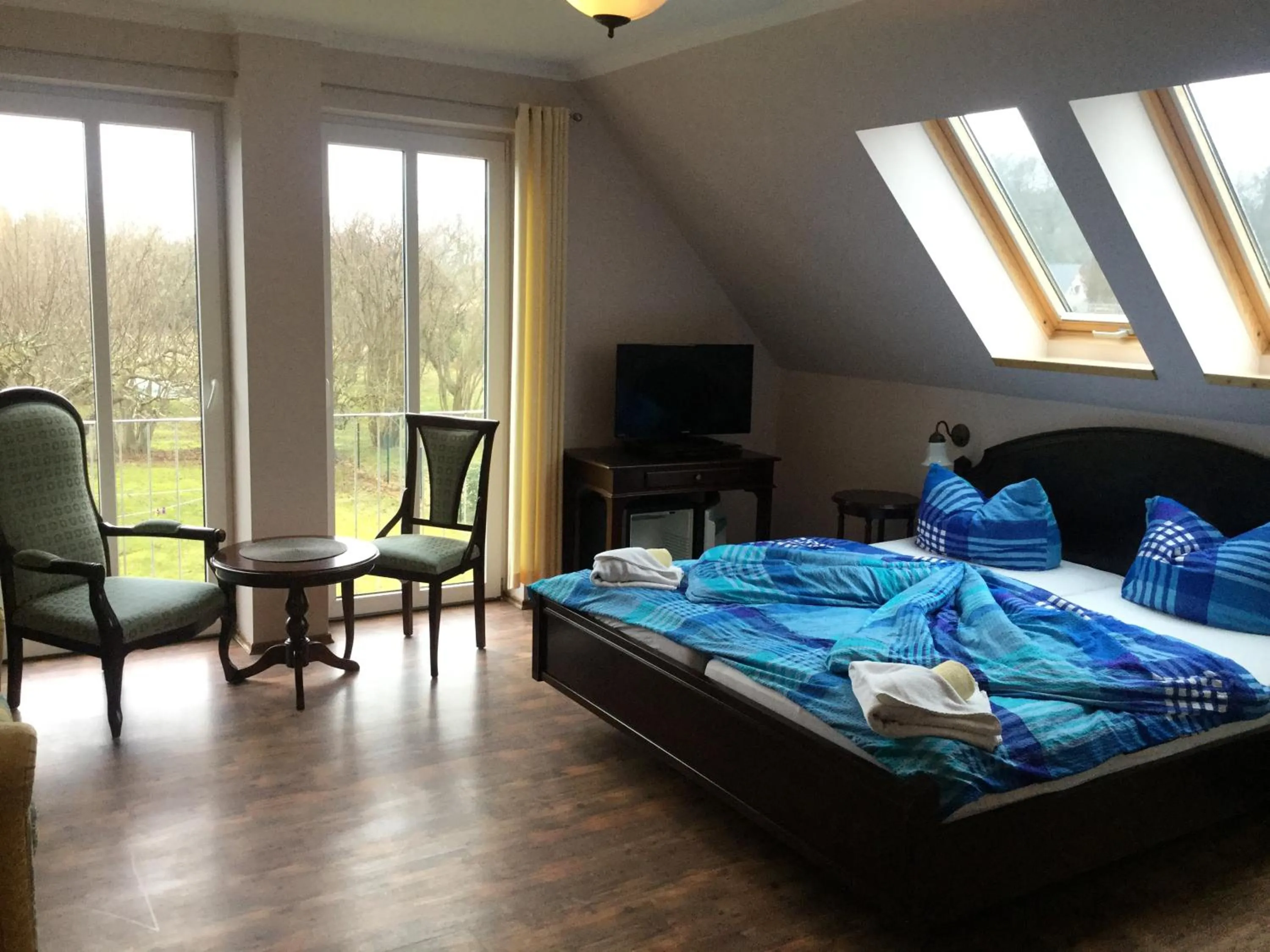 Photo of the whole room, Bed in Gästehaus Windflüchter