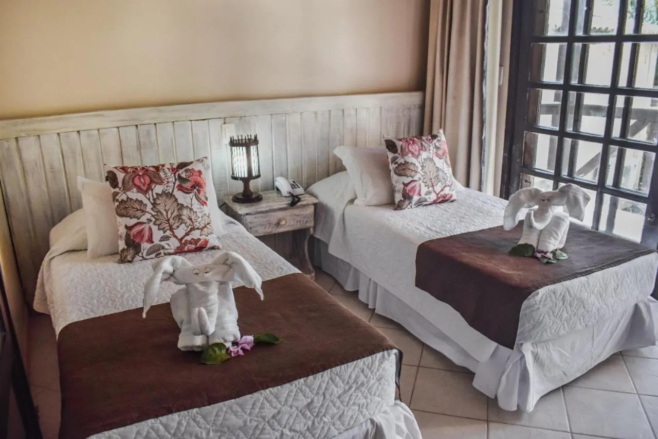 Bed in Pousada Recanto do Lobo