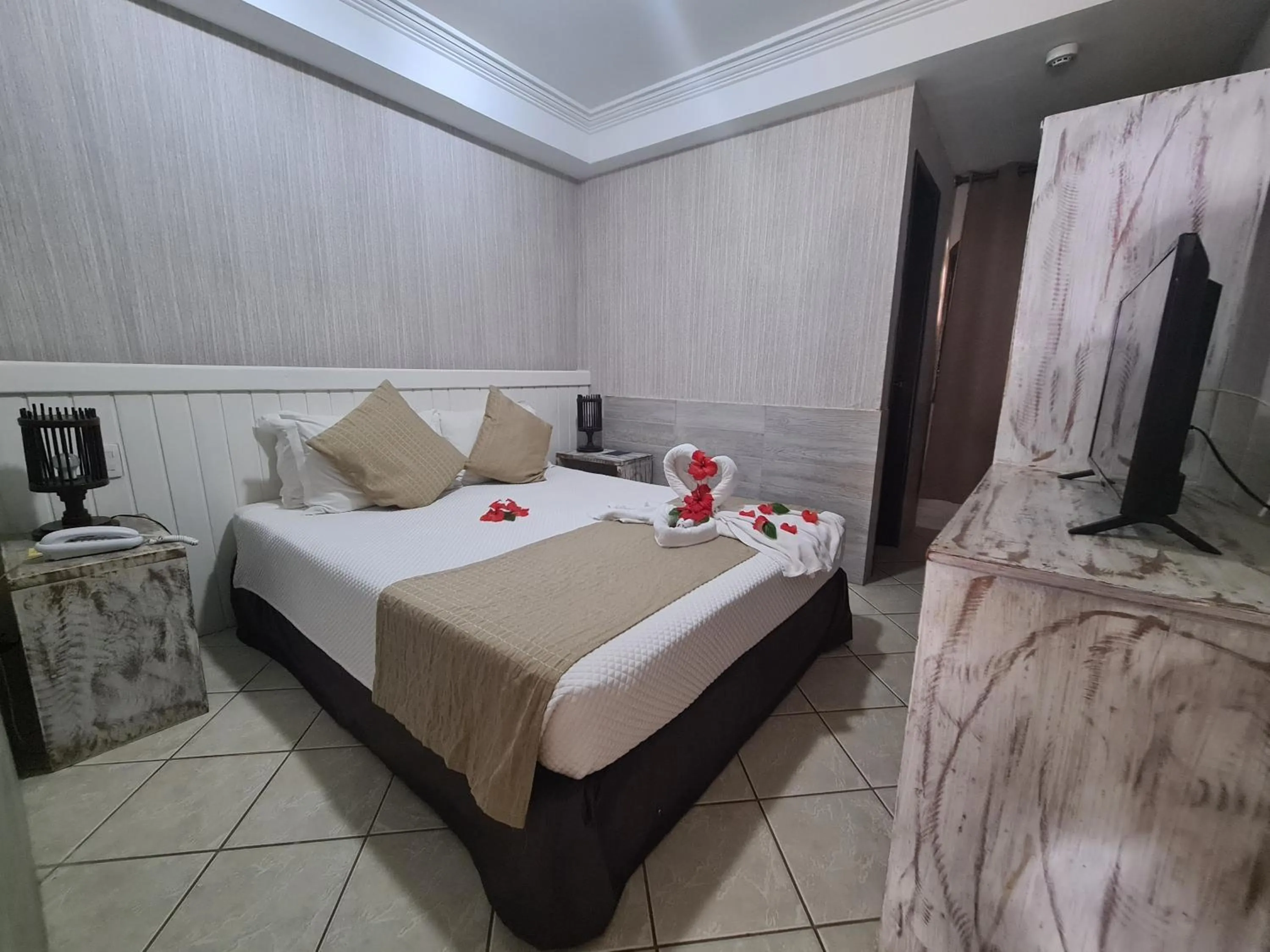 Bed in Pousada Recanto do Lobo