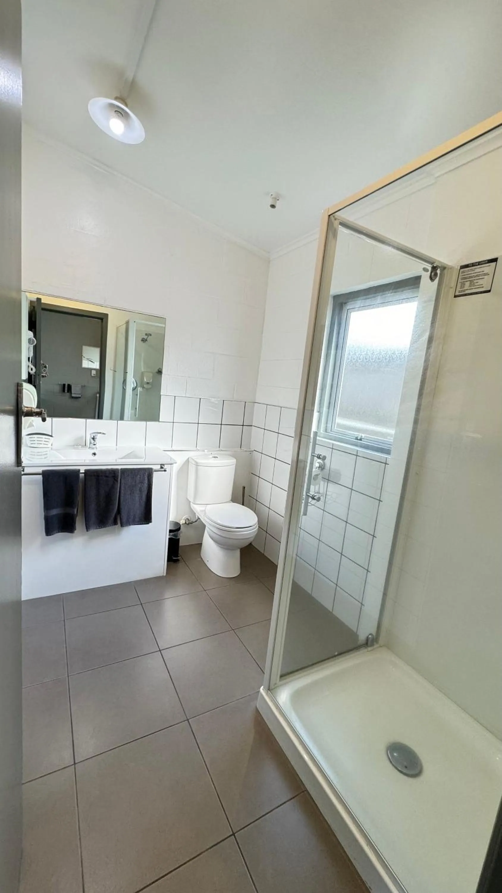 Shower in Central Court Motel