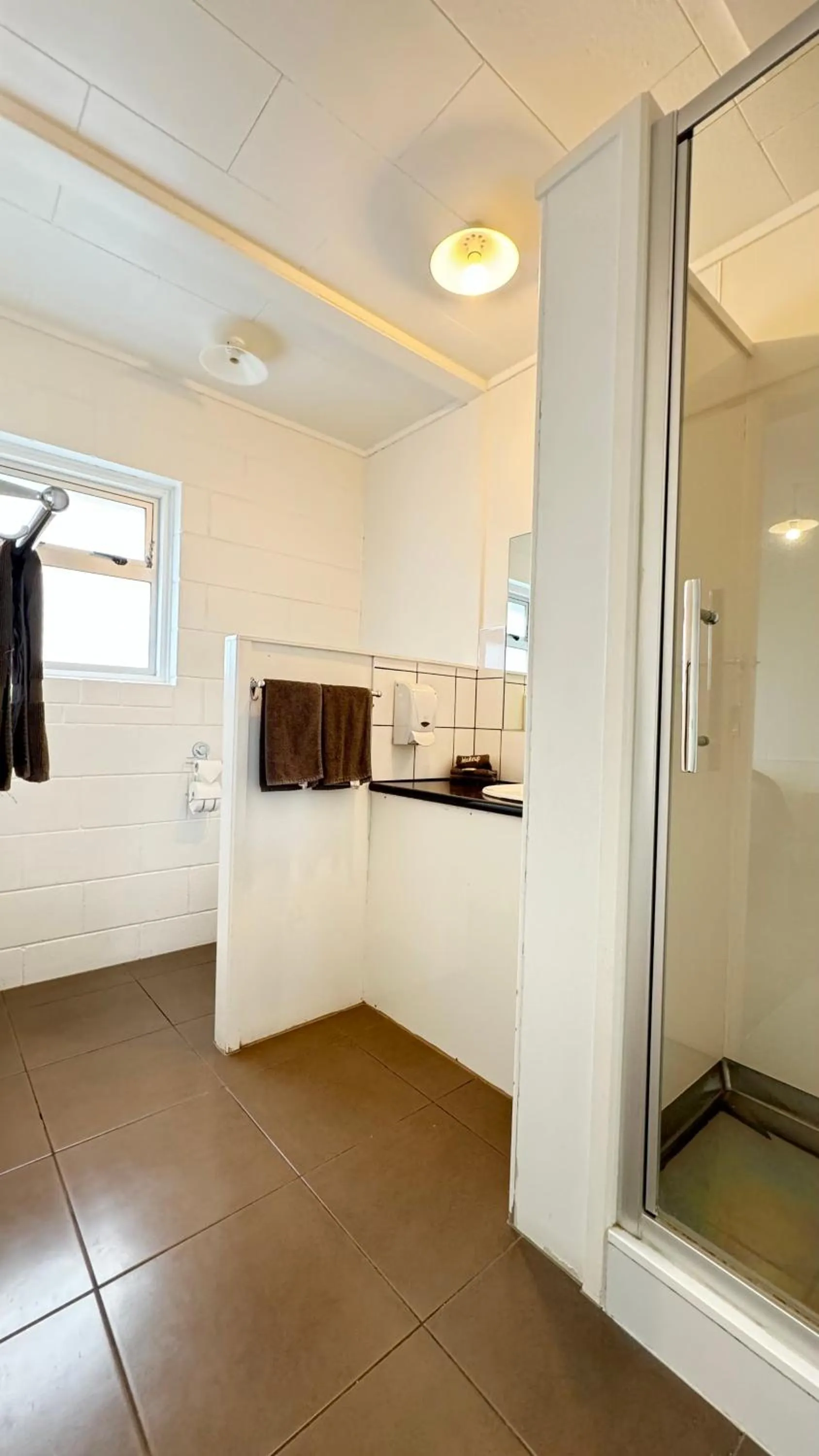 Shower in Central Court Motel