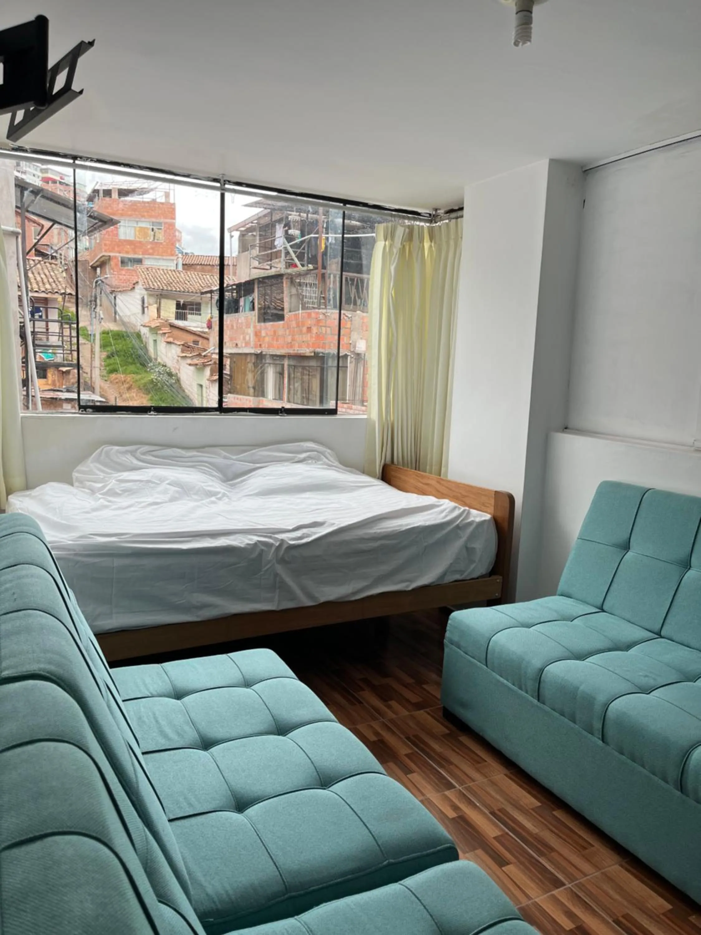 Living room, Bed in Namaste House