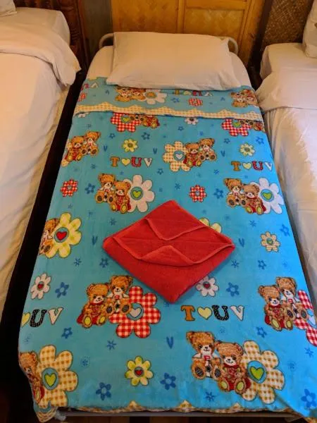 Bed in The Narima - SHA Plus