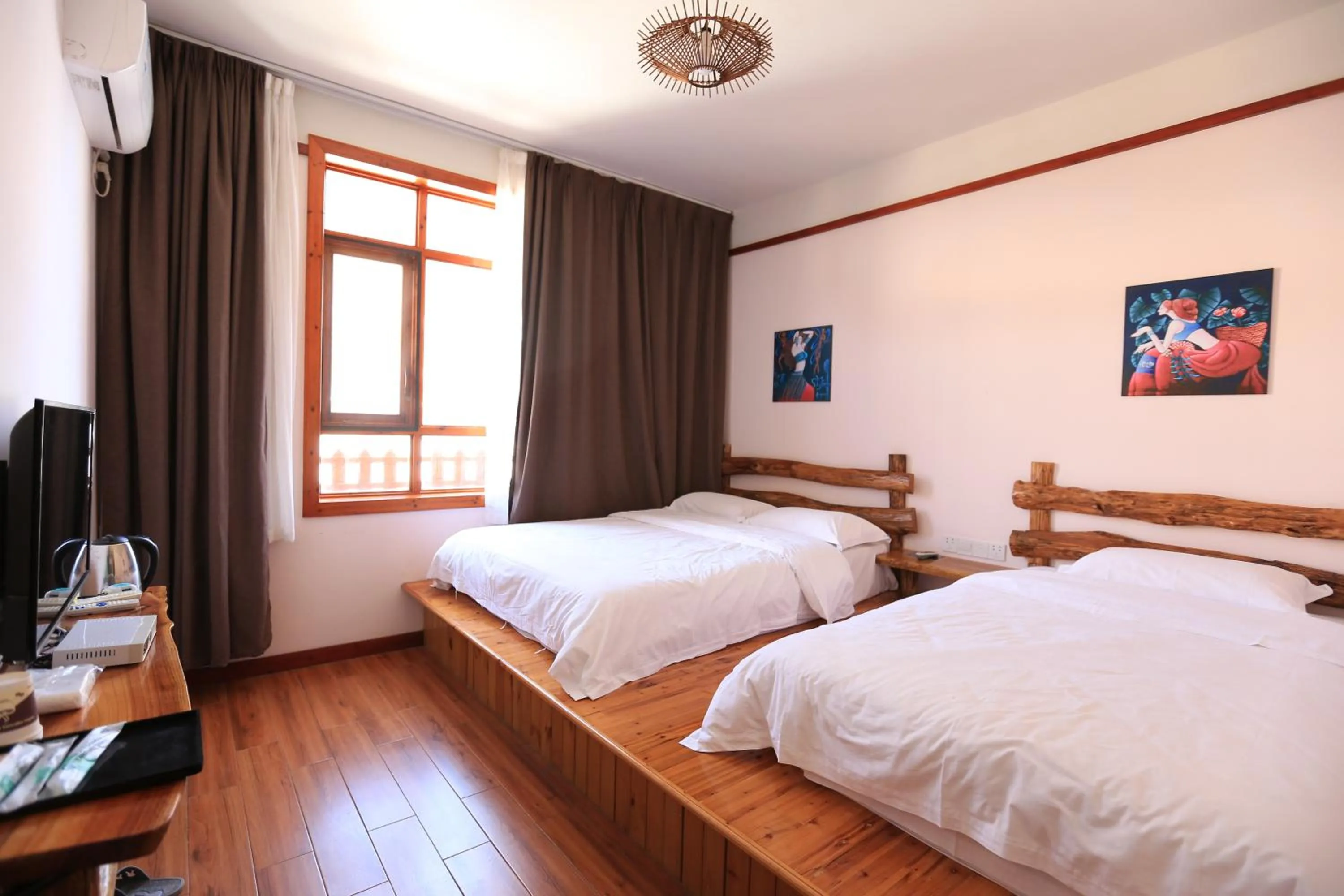 TV and multimedia in Yangshuo Xiao Long River Hotel