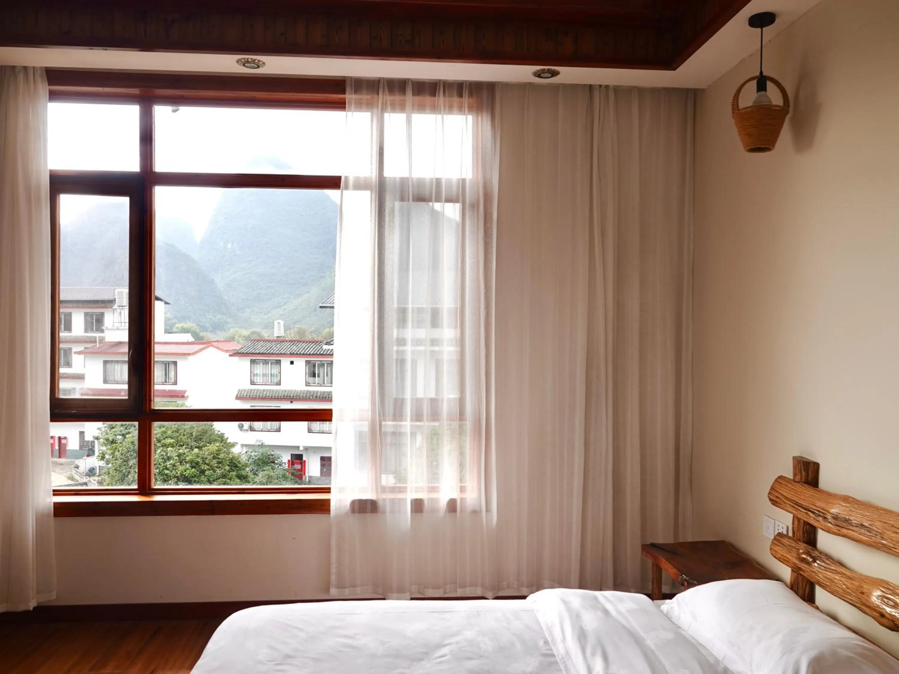 Bed in Yangshuo Xiao Long River Hotel