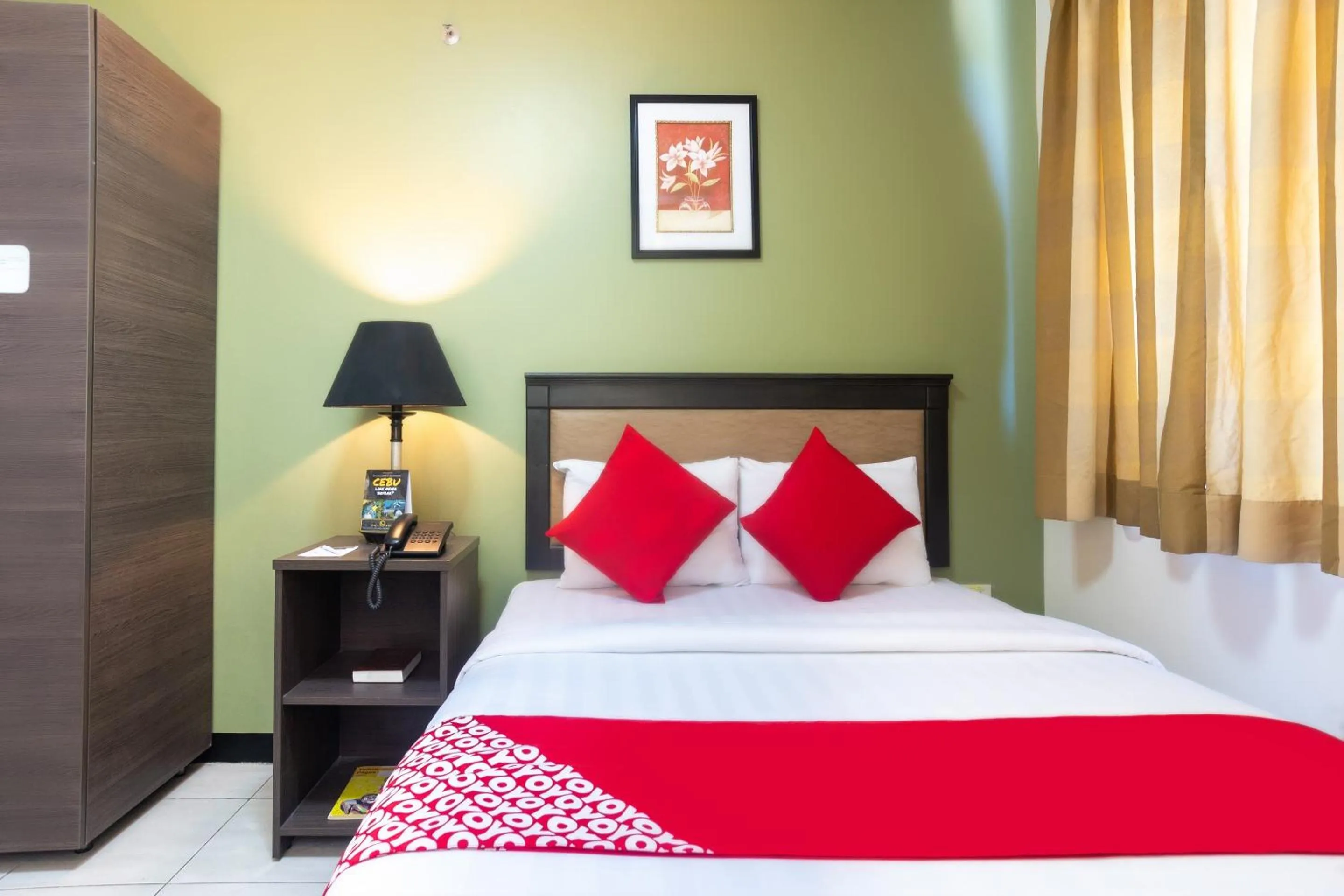 Bedroom in OYO 187 The Maxwell Hotel