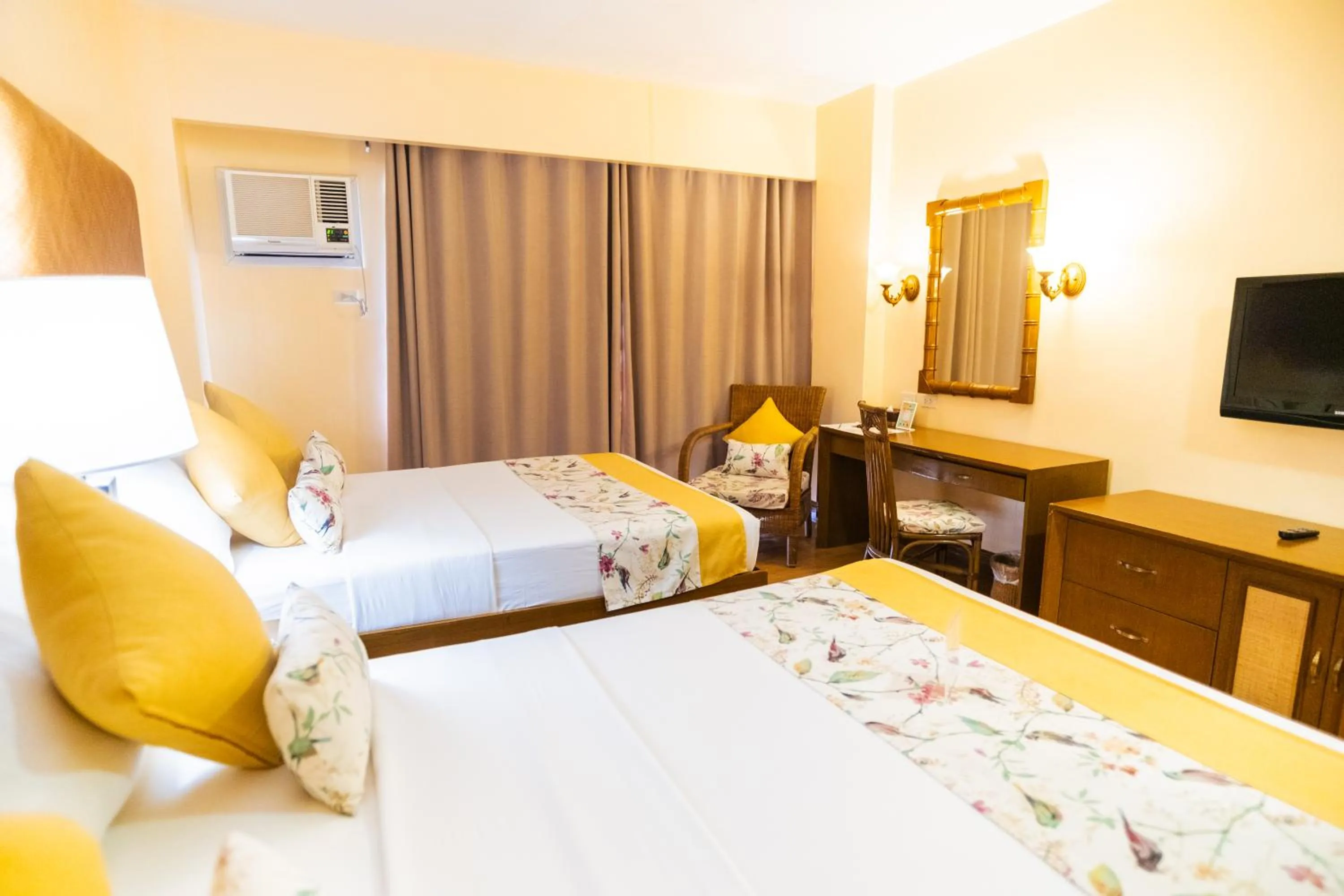 Bed in Boracay Tropics Resort Hotel