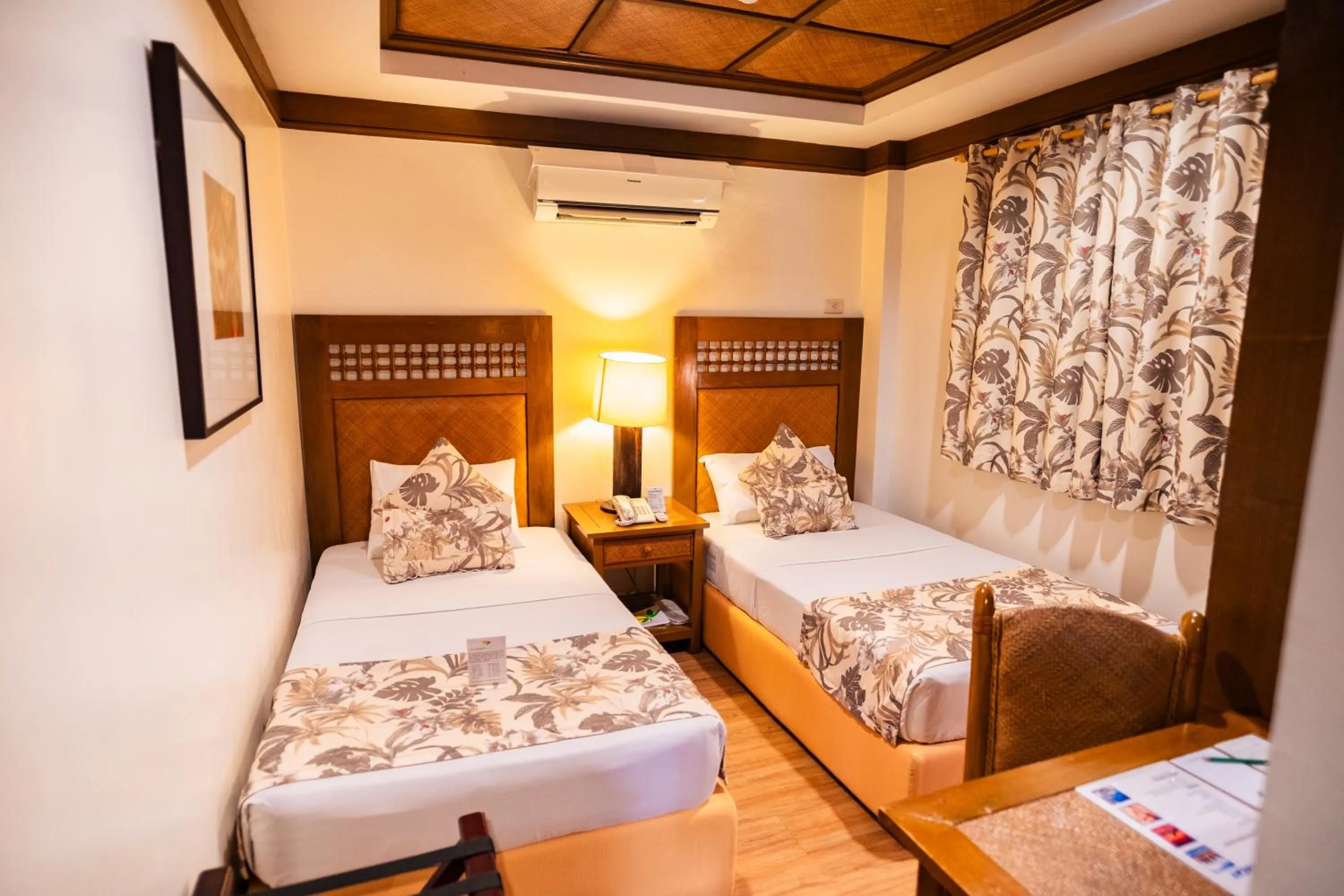 Bed in Boracay Tropics Resort Hotel