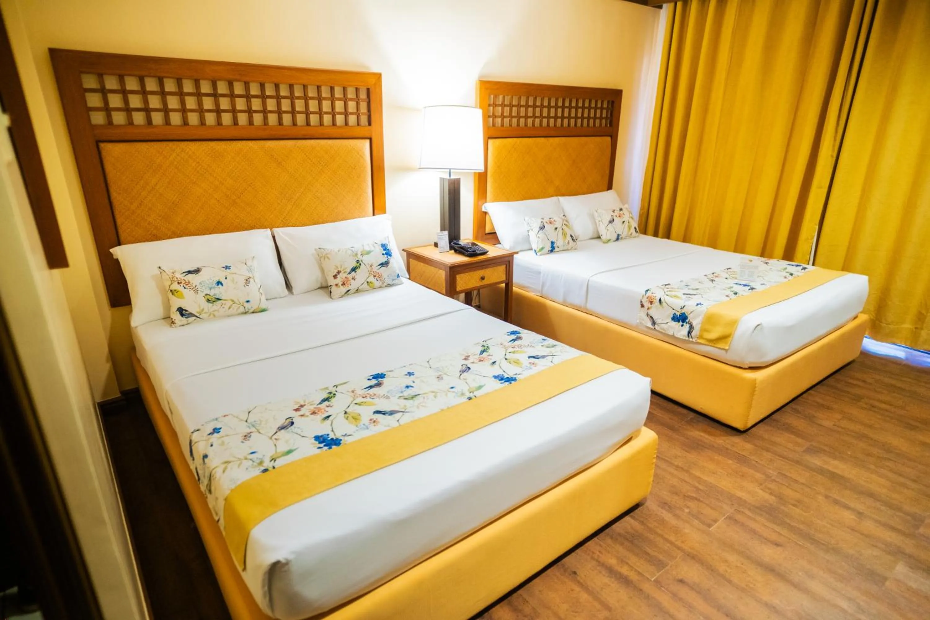 Bed in Boracay Tropics Resort Hotel