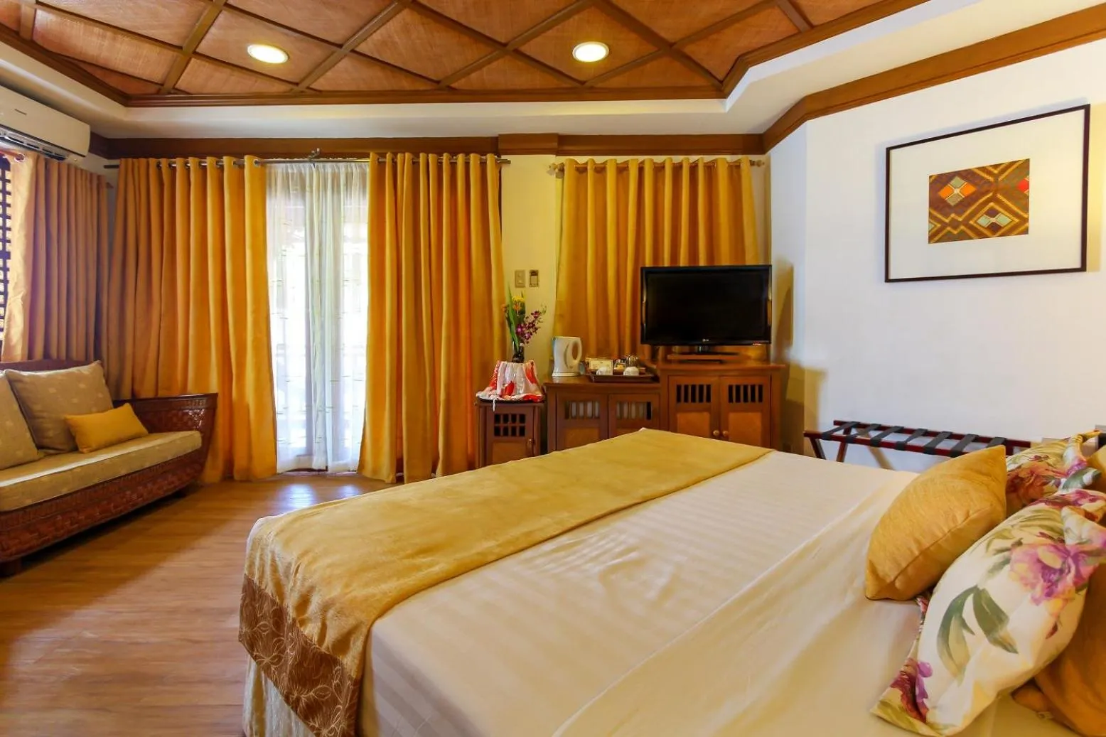 Bed in Boracay Tropics Resort Hotel