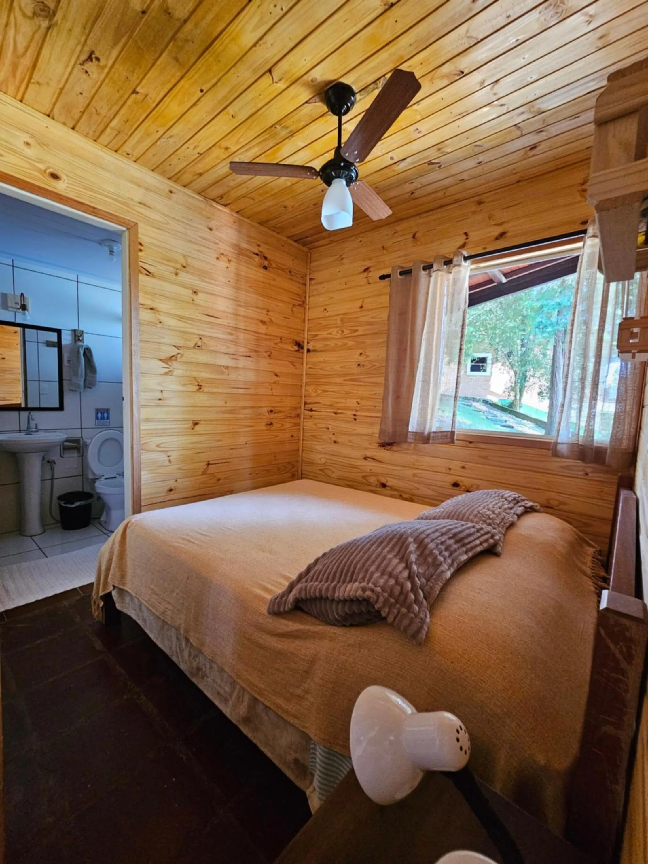 Bed in Chalé Karin Sampaio