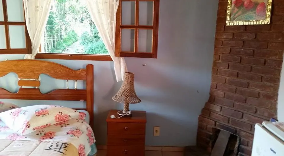 Bed in Pousada Sol Nascente