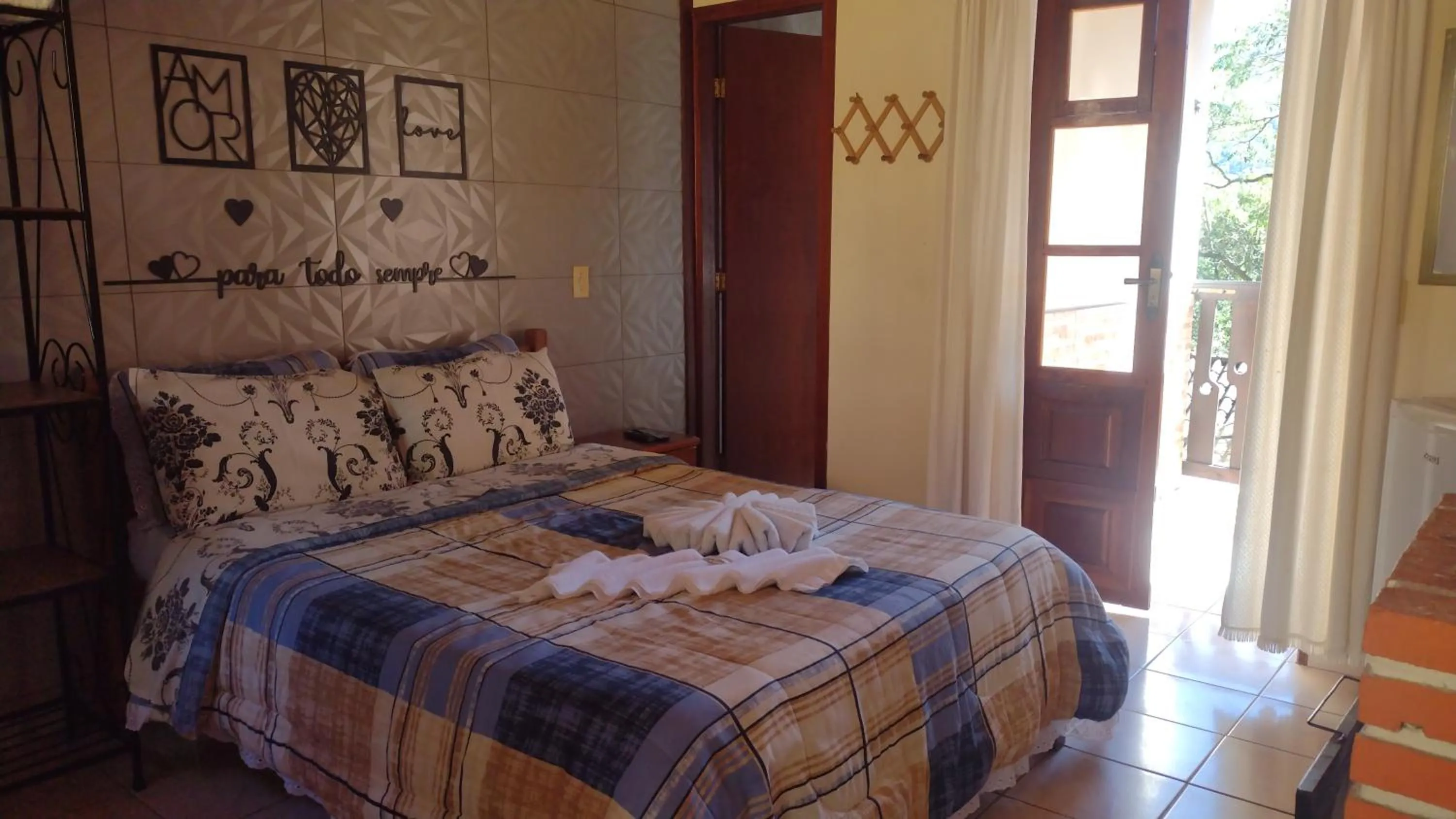 Bed in Pousada Sol Nascente