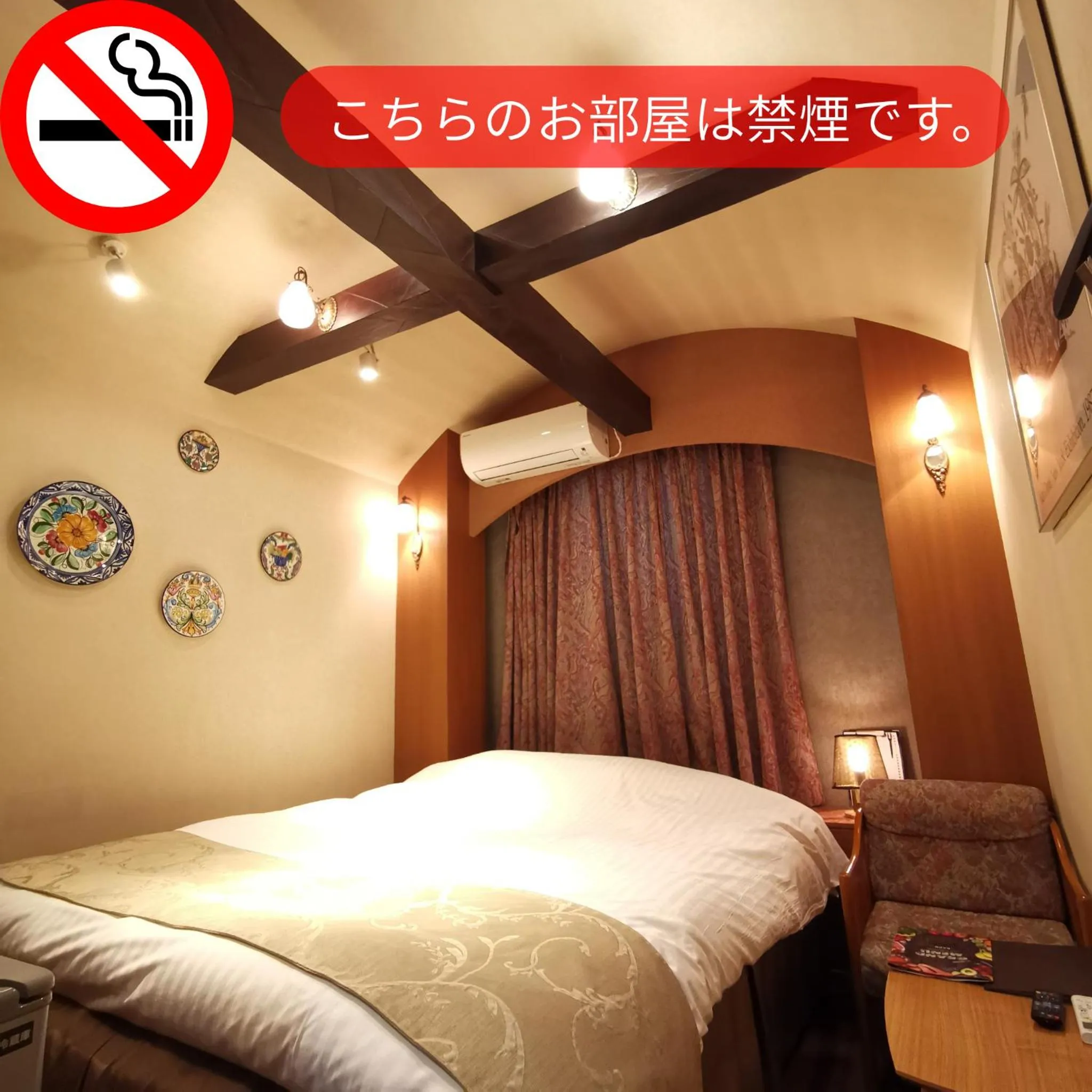 Bed in ホテル マリオン 鈴鹿