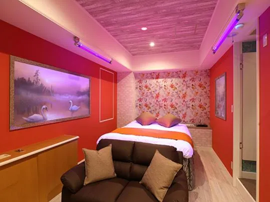 Bed in ホテル マリオン 鈴鹿