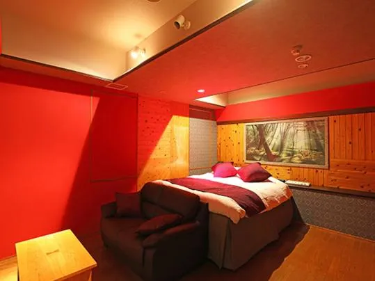 Bed in ホテル マリオン 鈴鹿