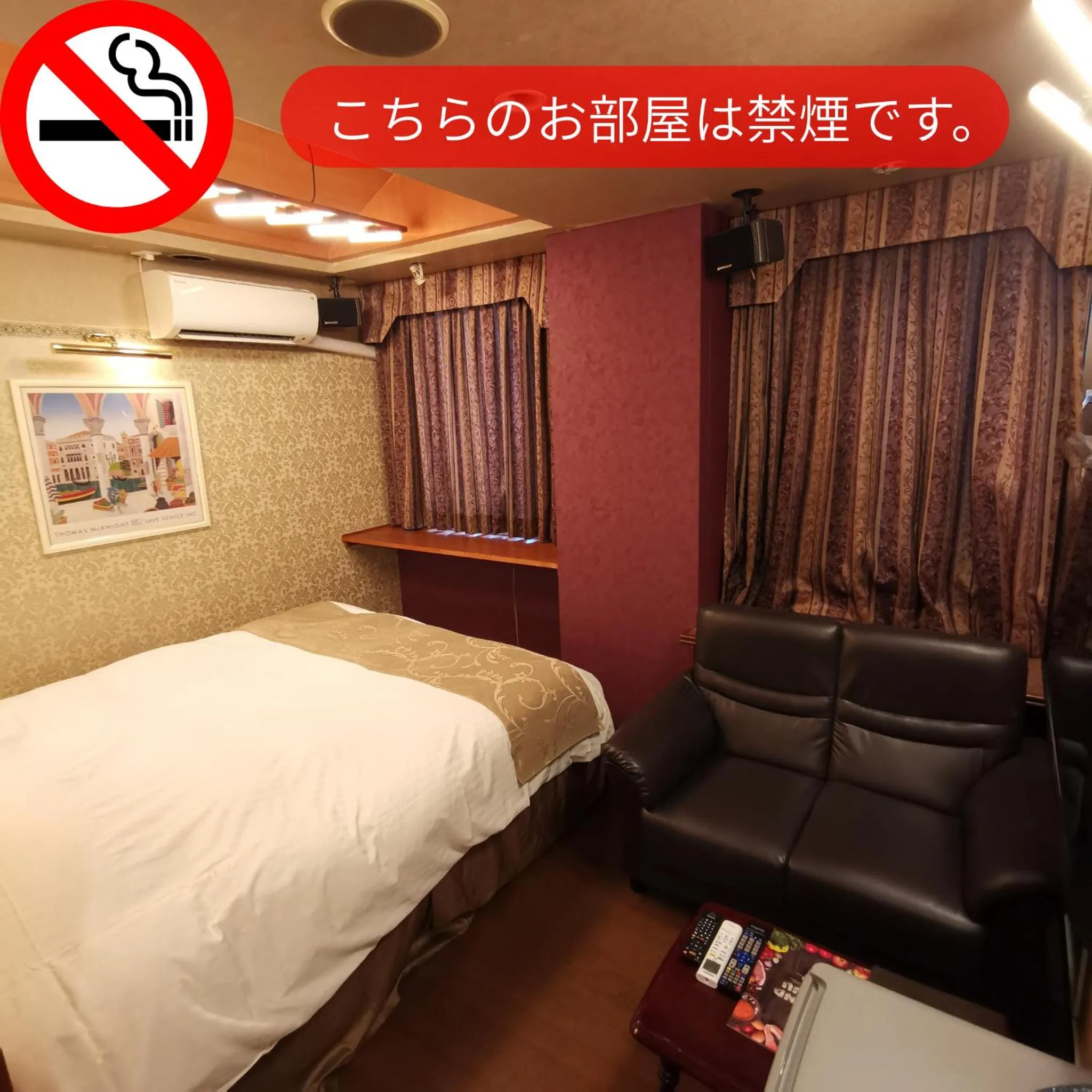 Bed in ホテル マリオン 鈴鹿