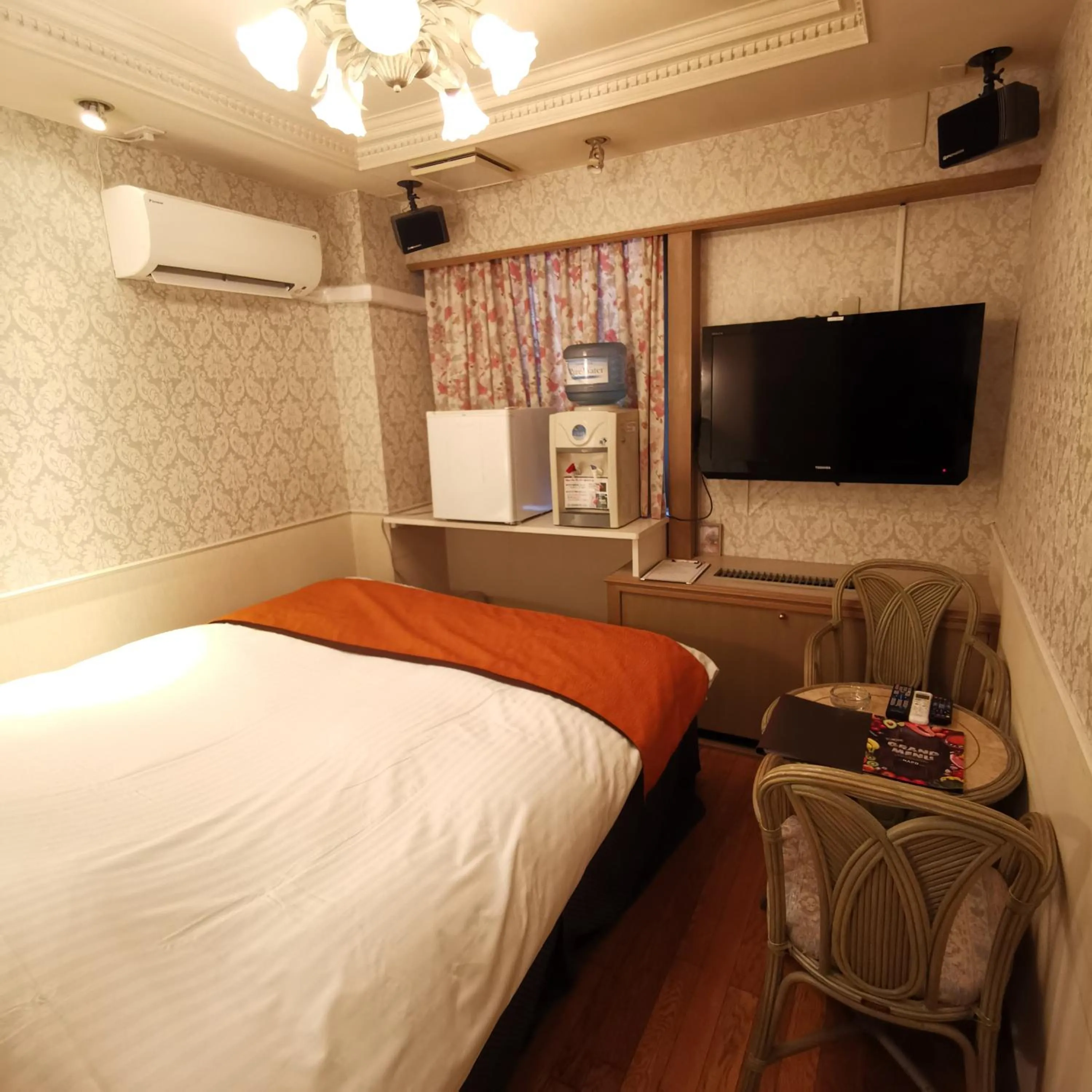 Bed in ホテル マリオン 鈴鹿