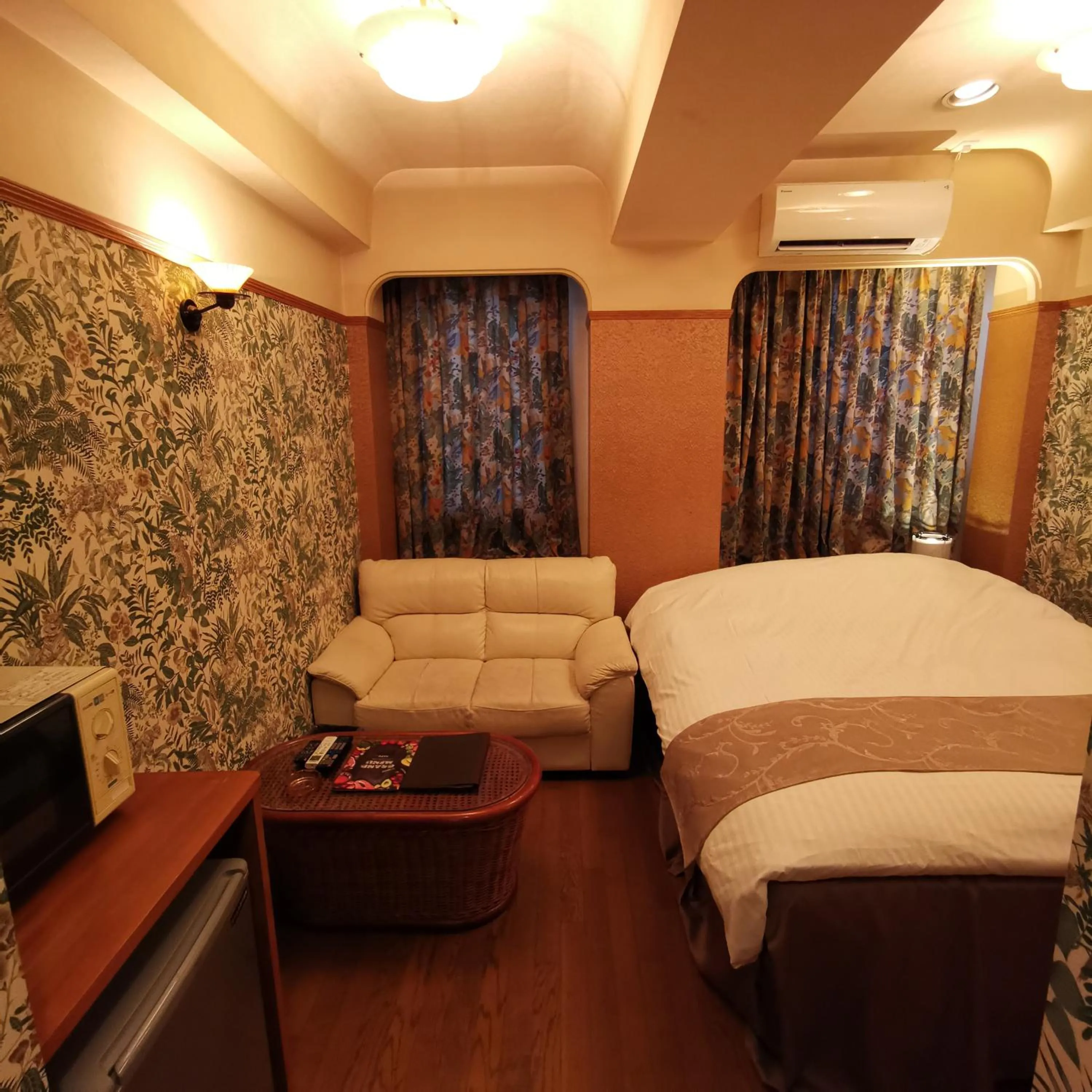 Bed in ホテル マリオン 鈴鹿