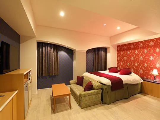 Bed in ホテル マリオン 鈴鹿