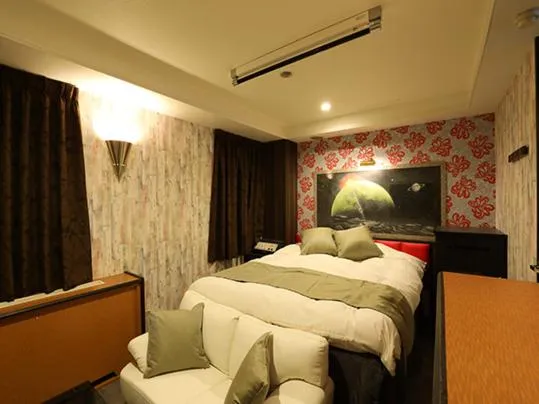 Bed in ホテル マリオン 鈴鹿