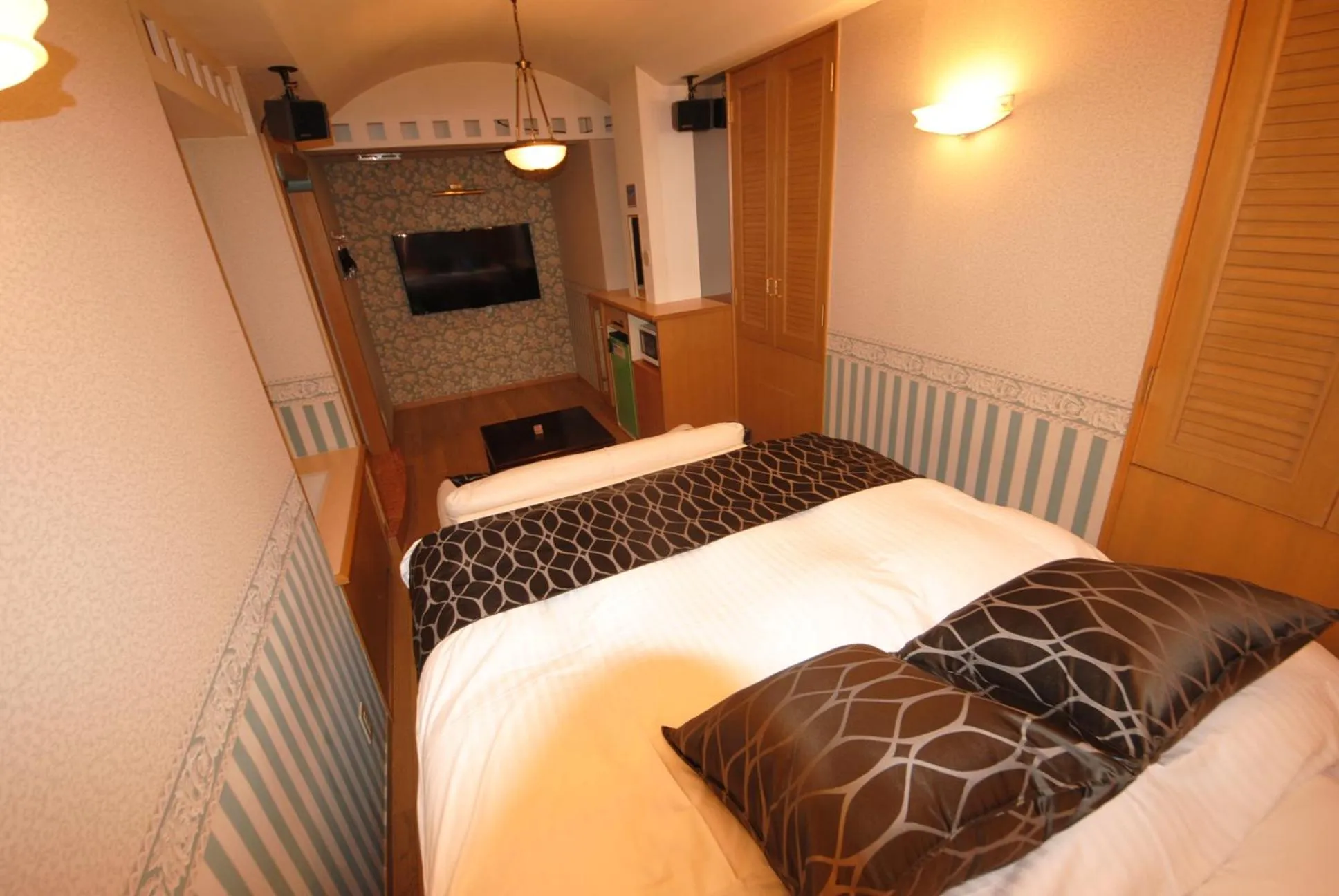 Bed in ホテル マリオン 鈴鹿