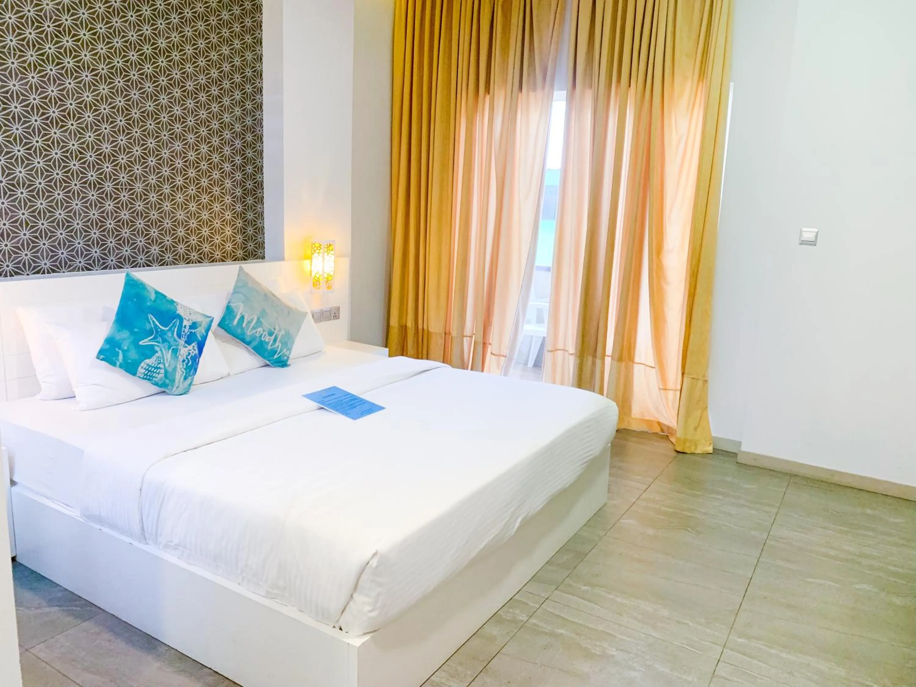 Bed in Velana Beach Hotel Maldives