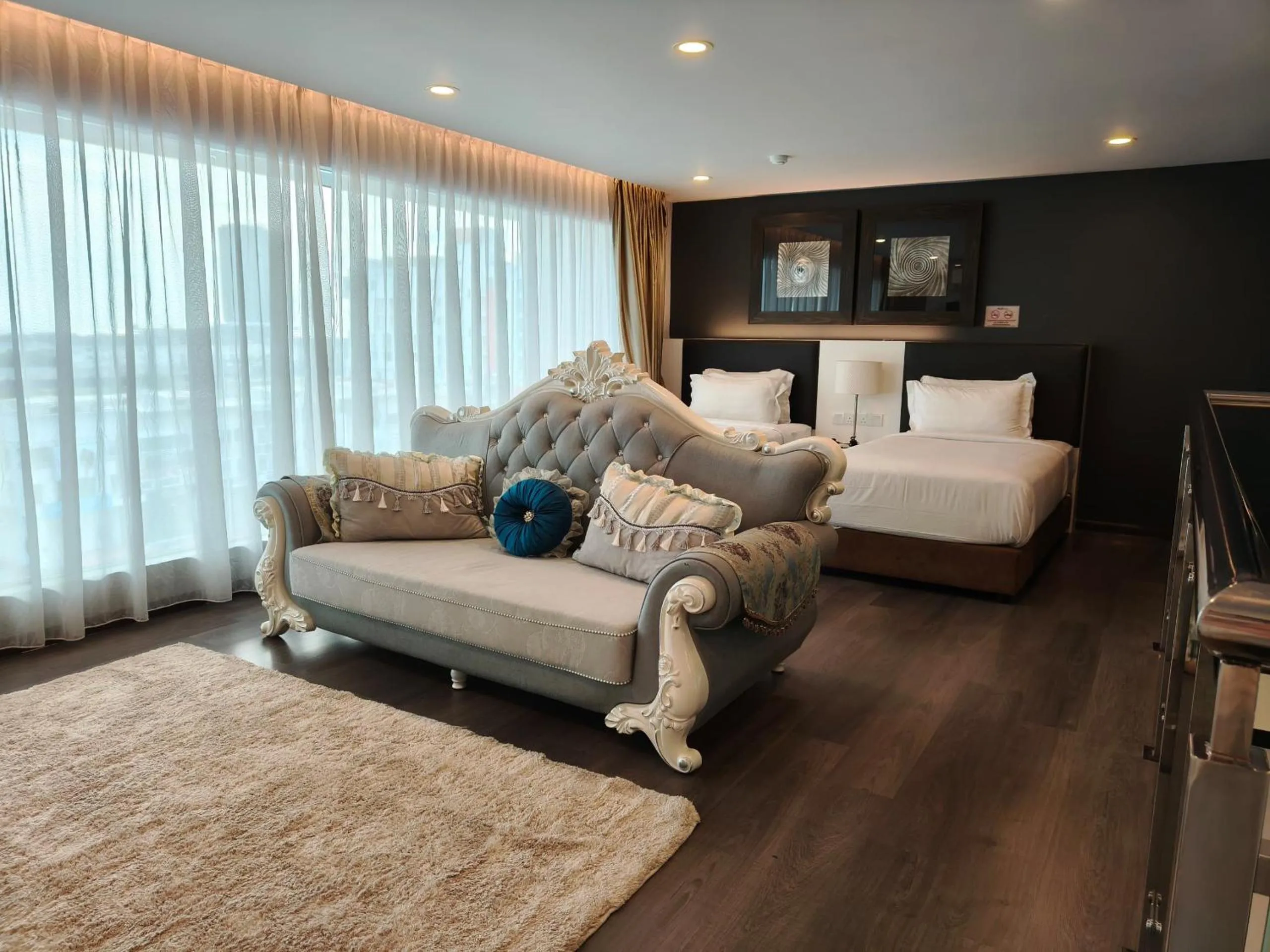 Seating area, Bed in Asiatic Hotel