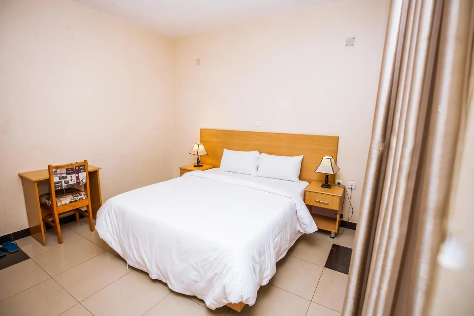 Bed in Anthurium Residential Hotel