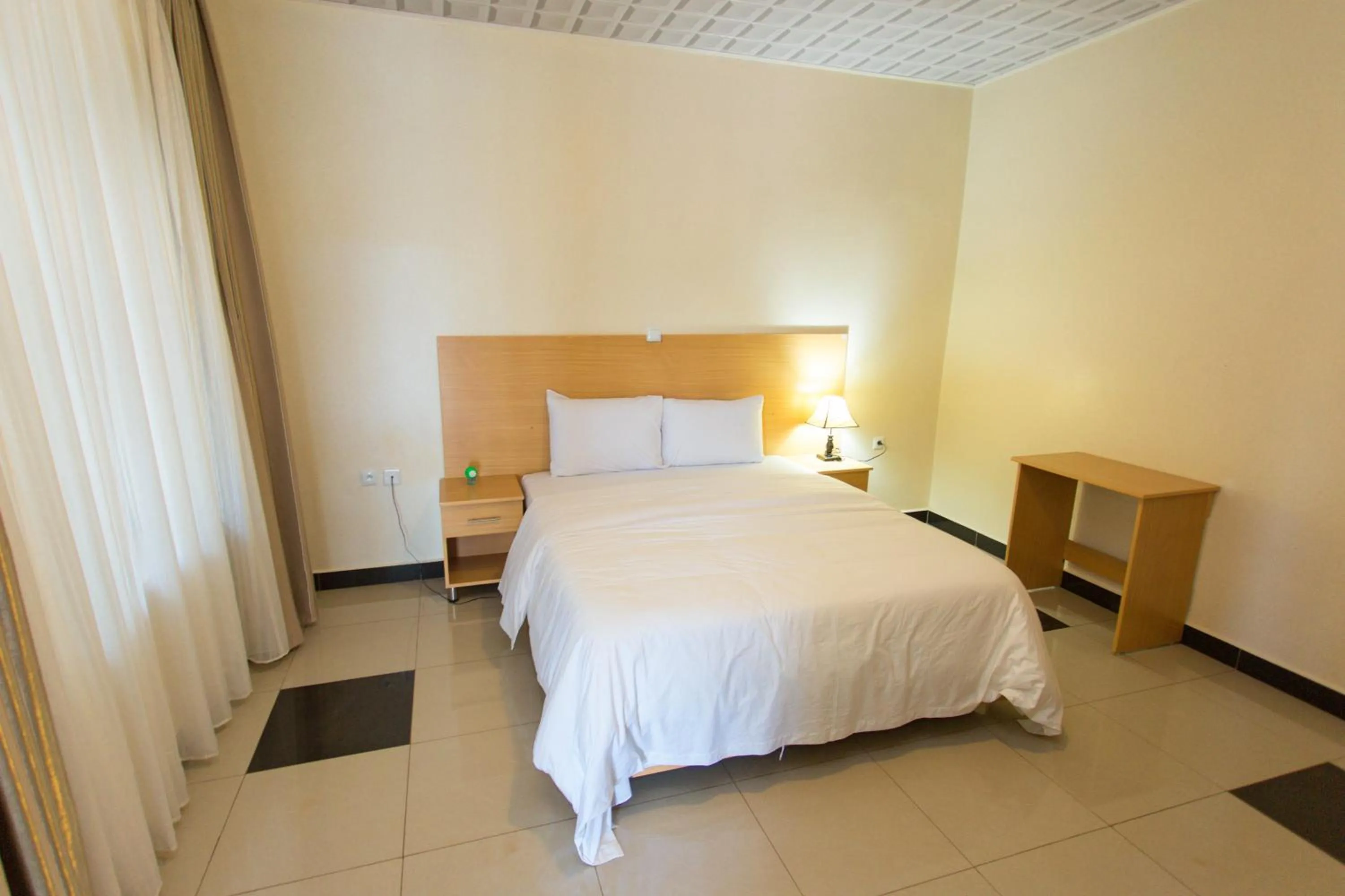 Bedroom in Anthurium Residential Hotel