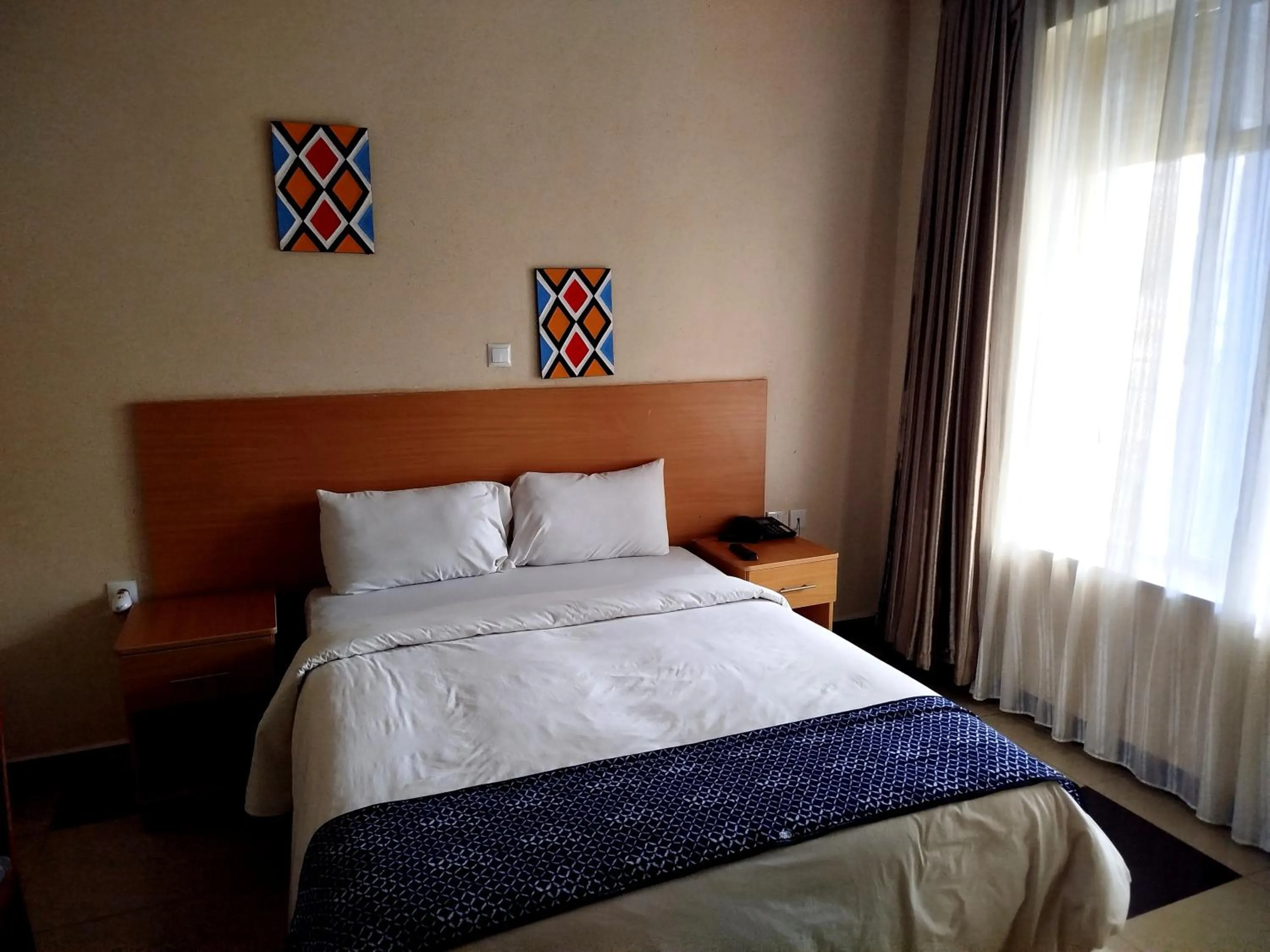 Bed in Anthurium Residential Hotel